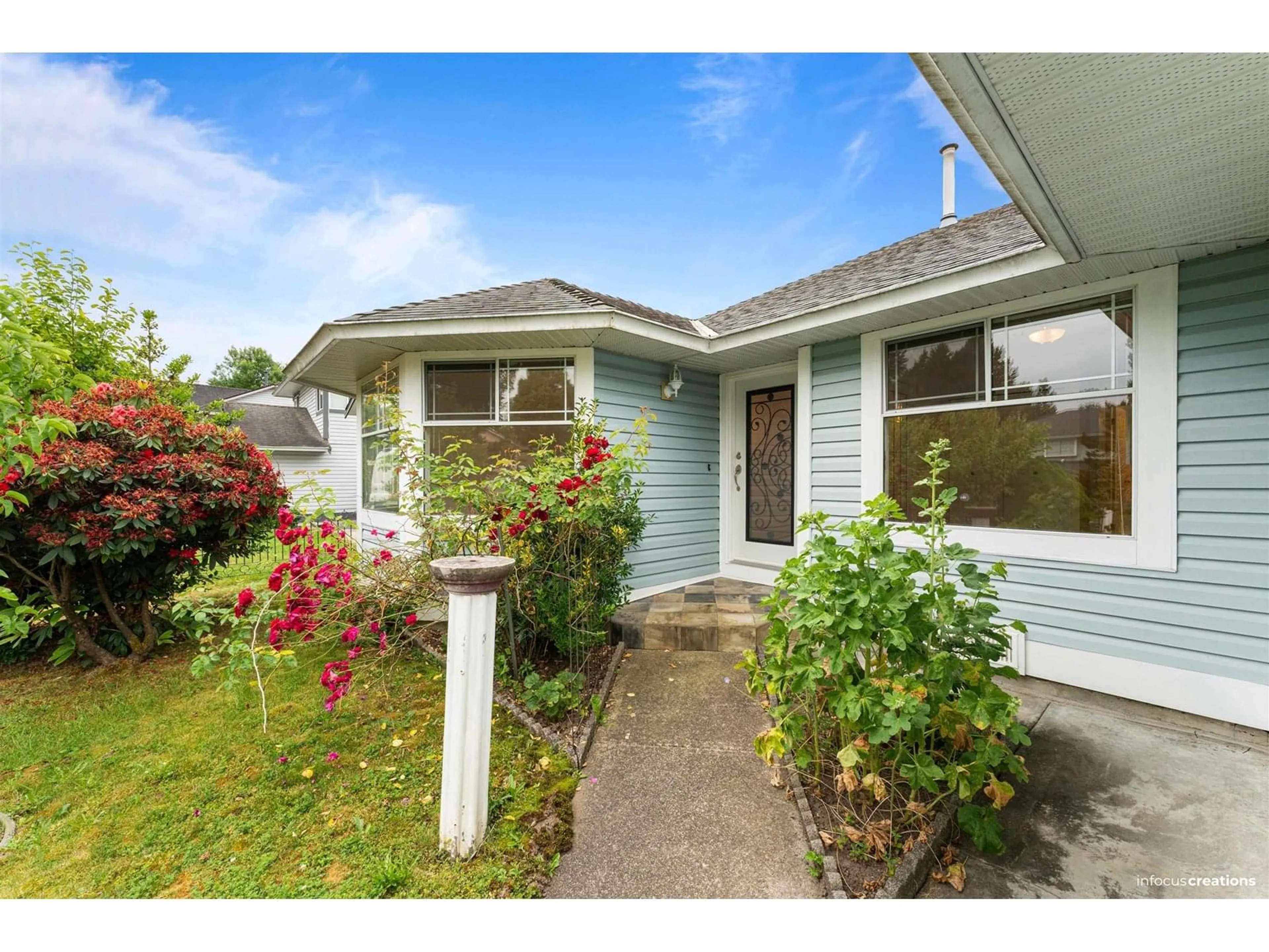 Home with vinyl exterior material, street for 9393 160A, Surrey British Columbia V4N2P4