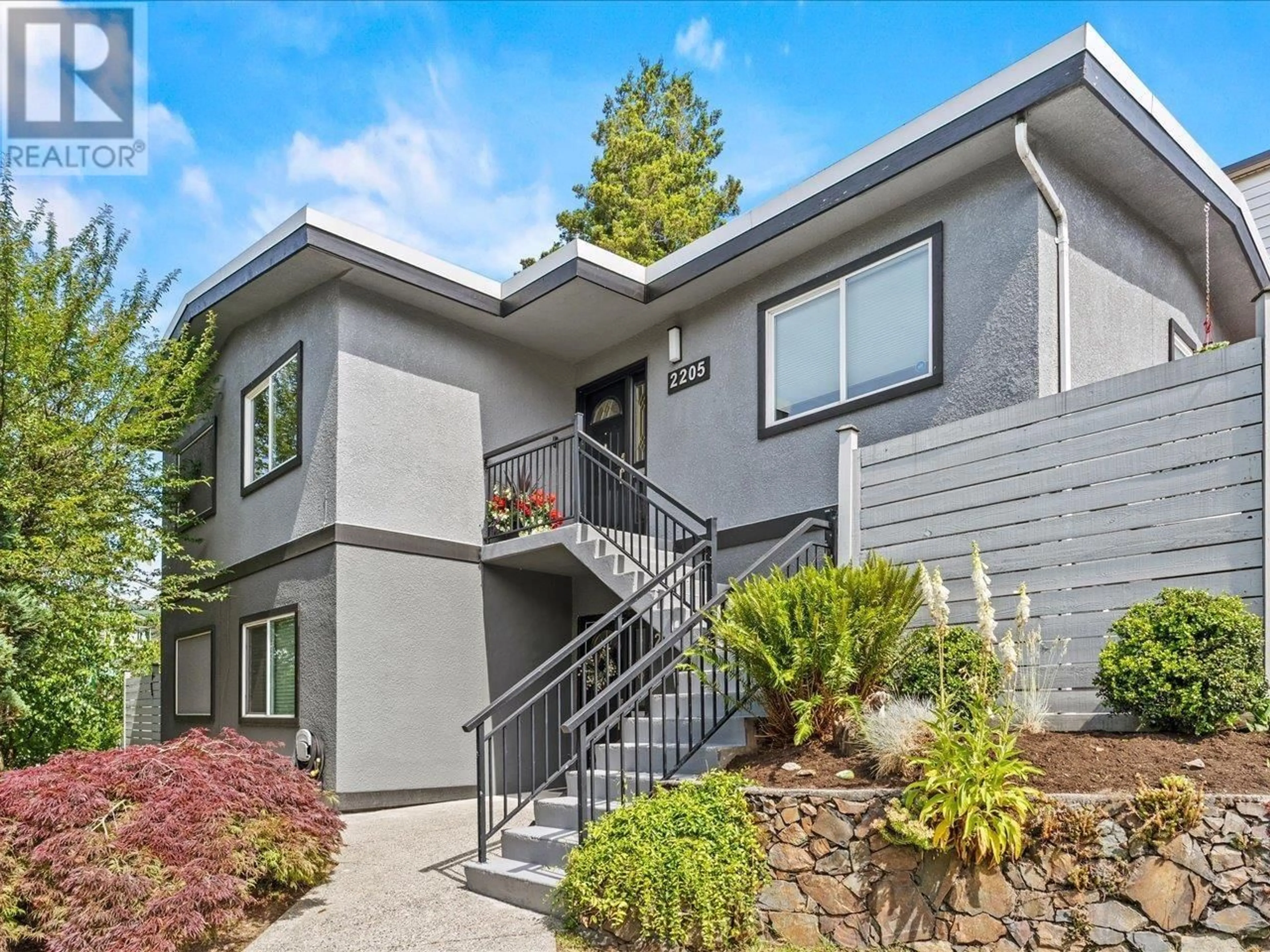 Home with vinyl exterior material, street for 2205 MCGILL STREET, Vancouver British Columbia V5L1C3