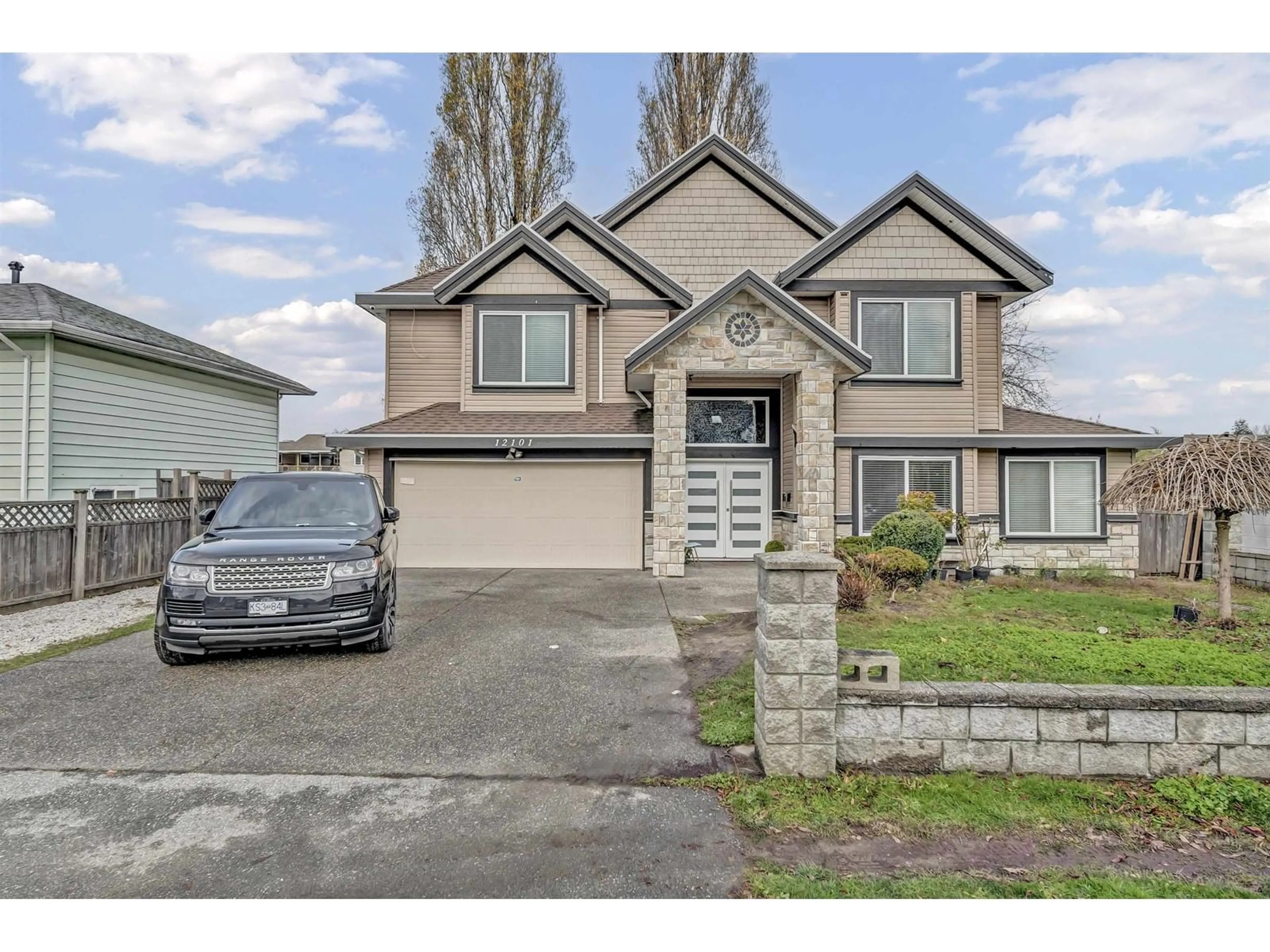 Home with vinyl exterior material, street for 12101 84, Surrey British Columbia V3W3G4