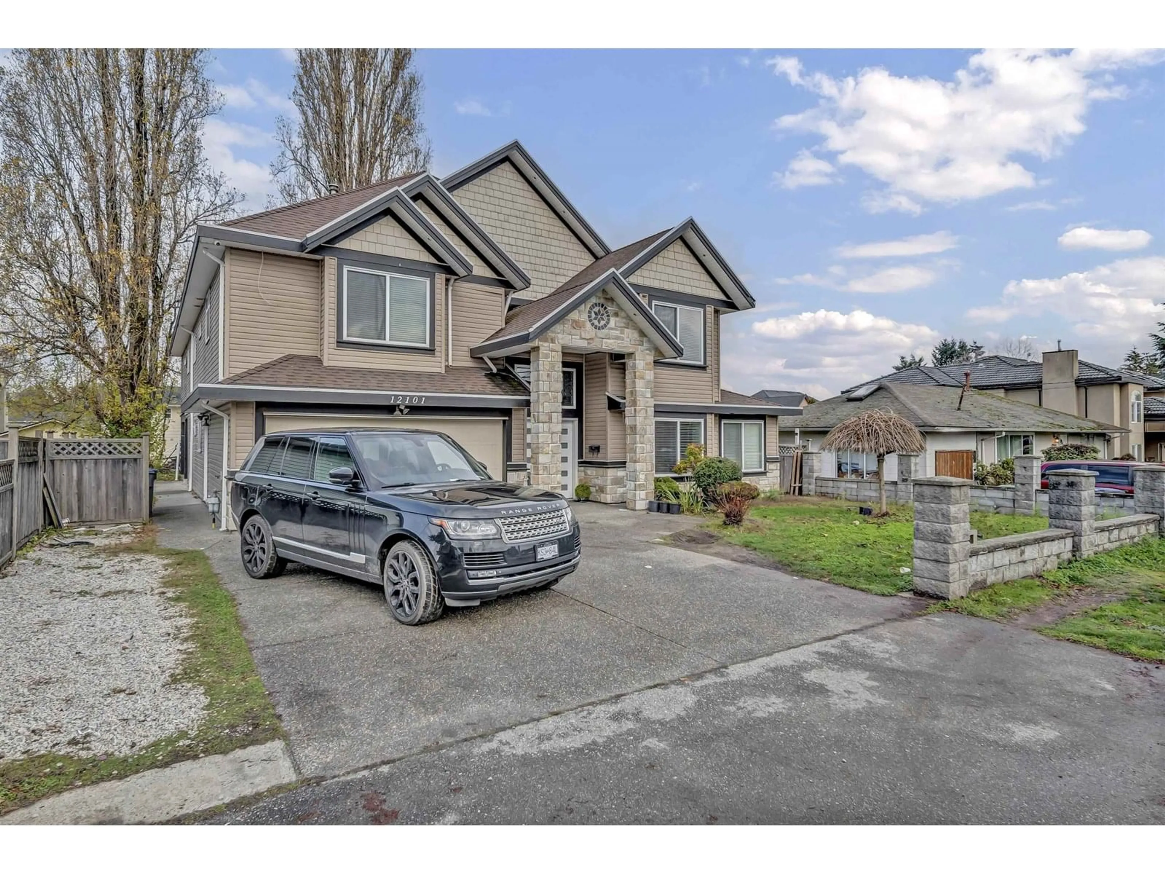 Home with vinyl exterior material, street for 12101 84, Surrey British Columbia V3W3G4