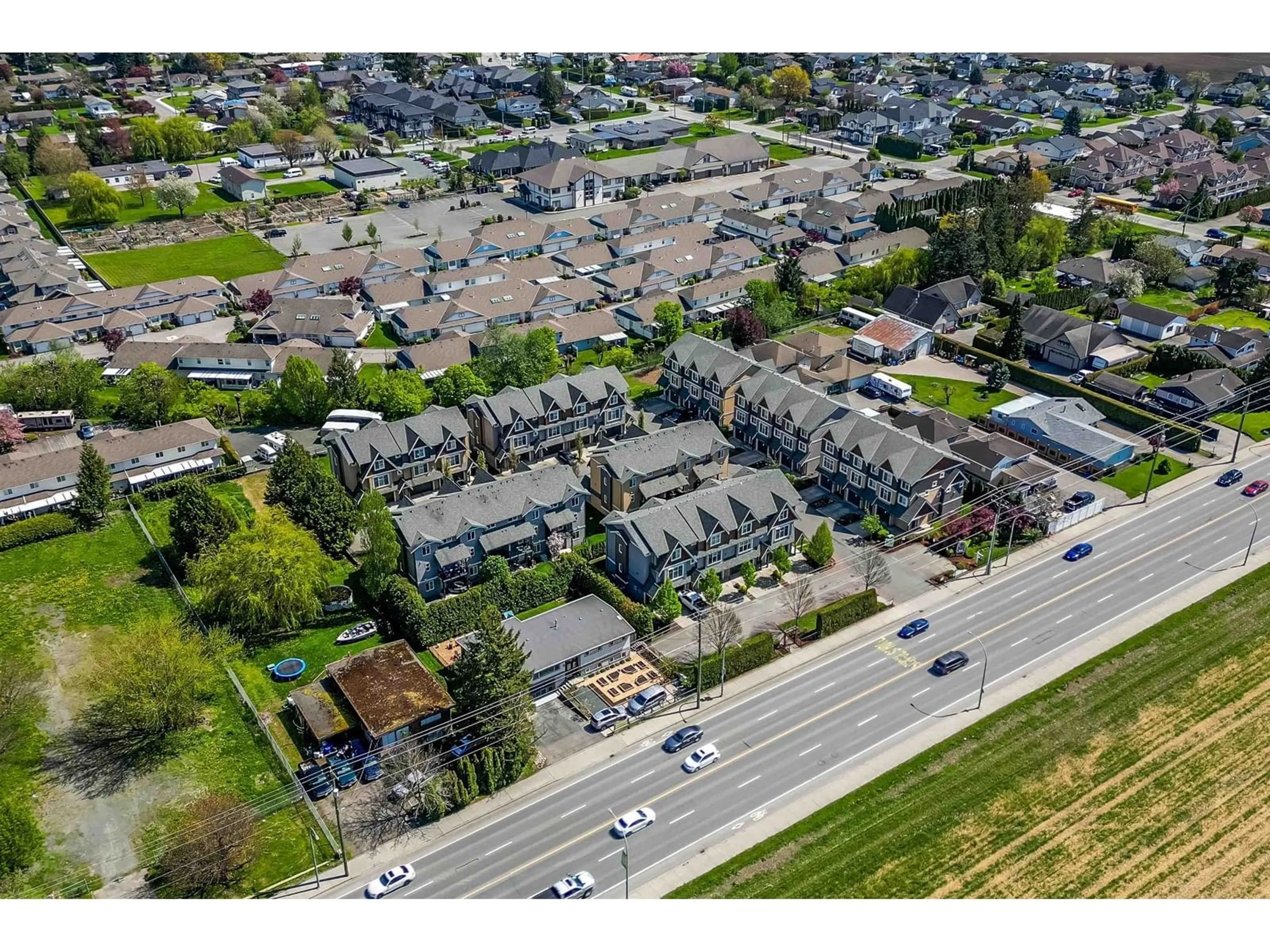 A pic from outside/outdoor area/front of a property/back of a property/a pic from drone, street for 22 - 7428 EVANS ROAD, Chilliwack British Columbia V2R0S5
