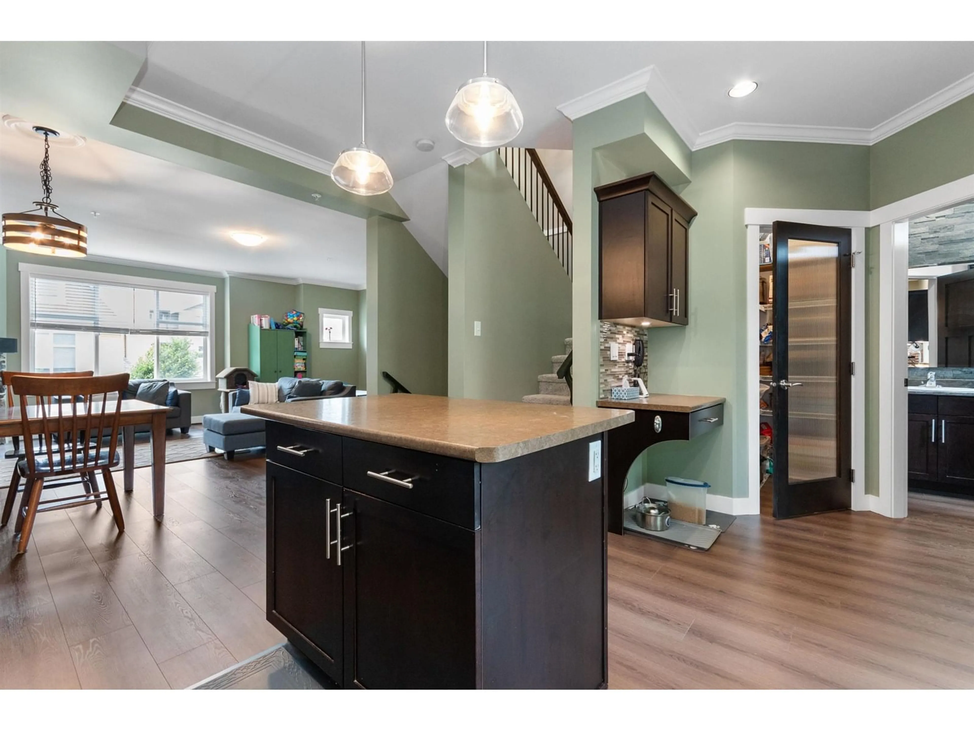 Open concept kitchen, wood/laminate floor for 22 - 7428 EVANS ROAD, Chilliwack British Columbia V2R0S5