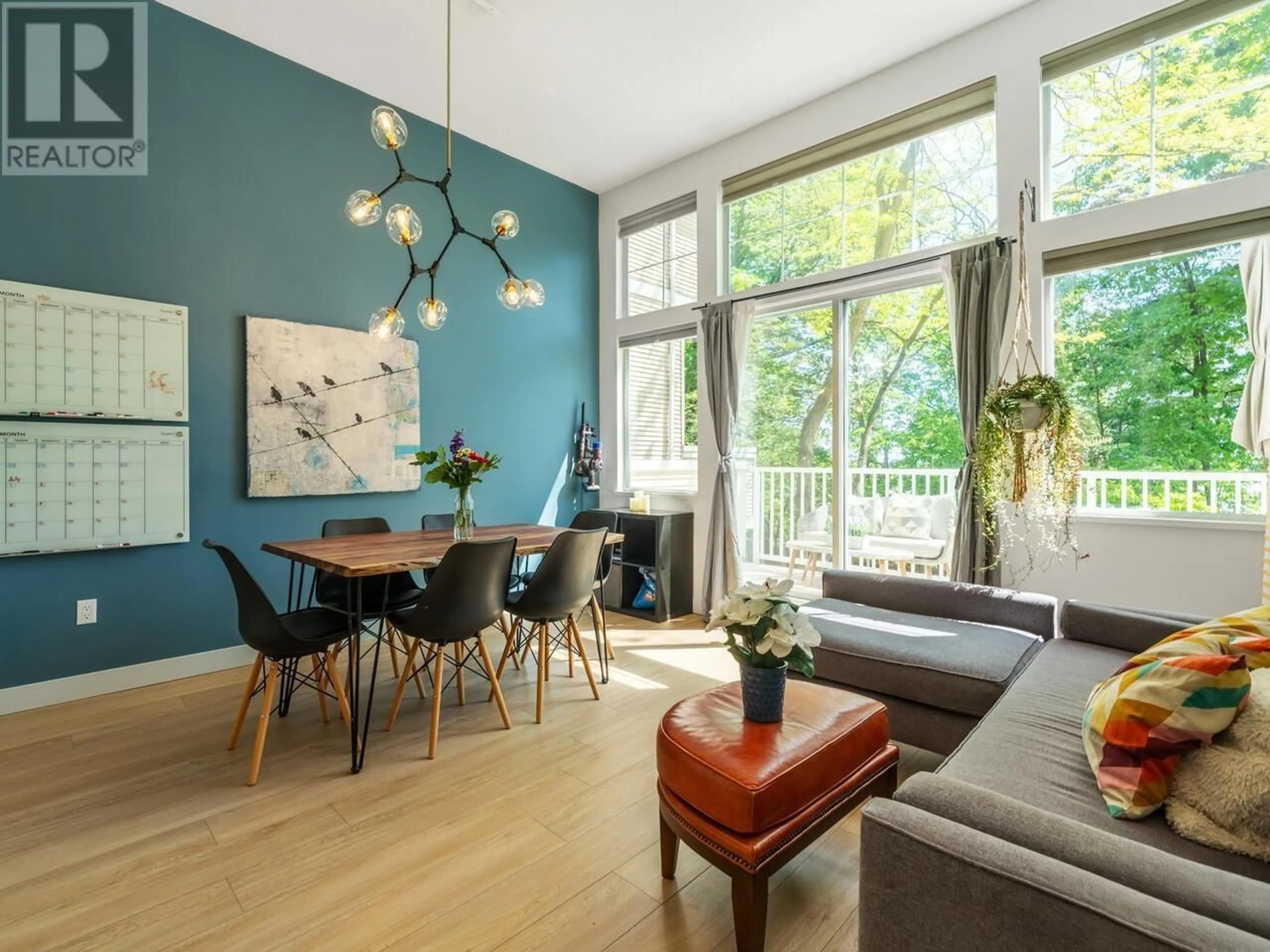 Living room with furniture, wood/laminate floor for 4 - 3572 RAINIER PLACE, Vancouver British Columbia V5S4T3