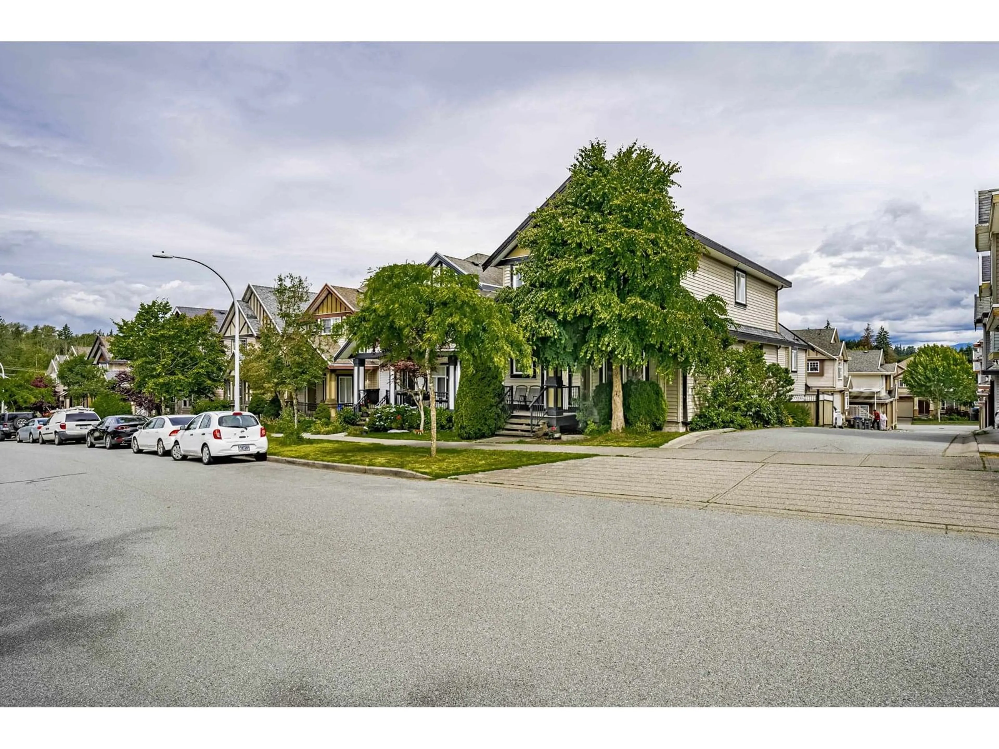 A pic from outside/outdoor area/front of a property/back of a property/a pic from drone, street for 14195 62A, Surrey British Columbia V3X0B2