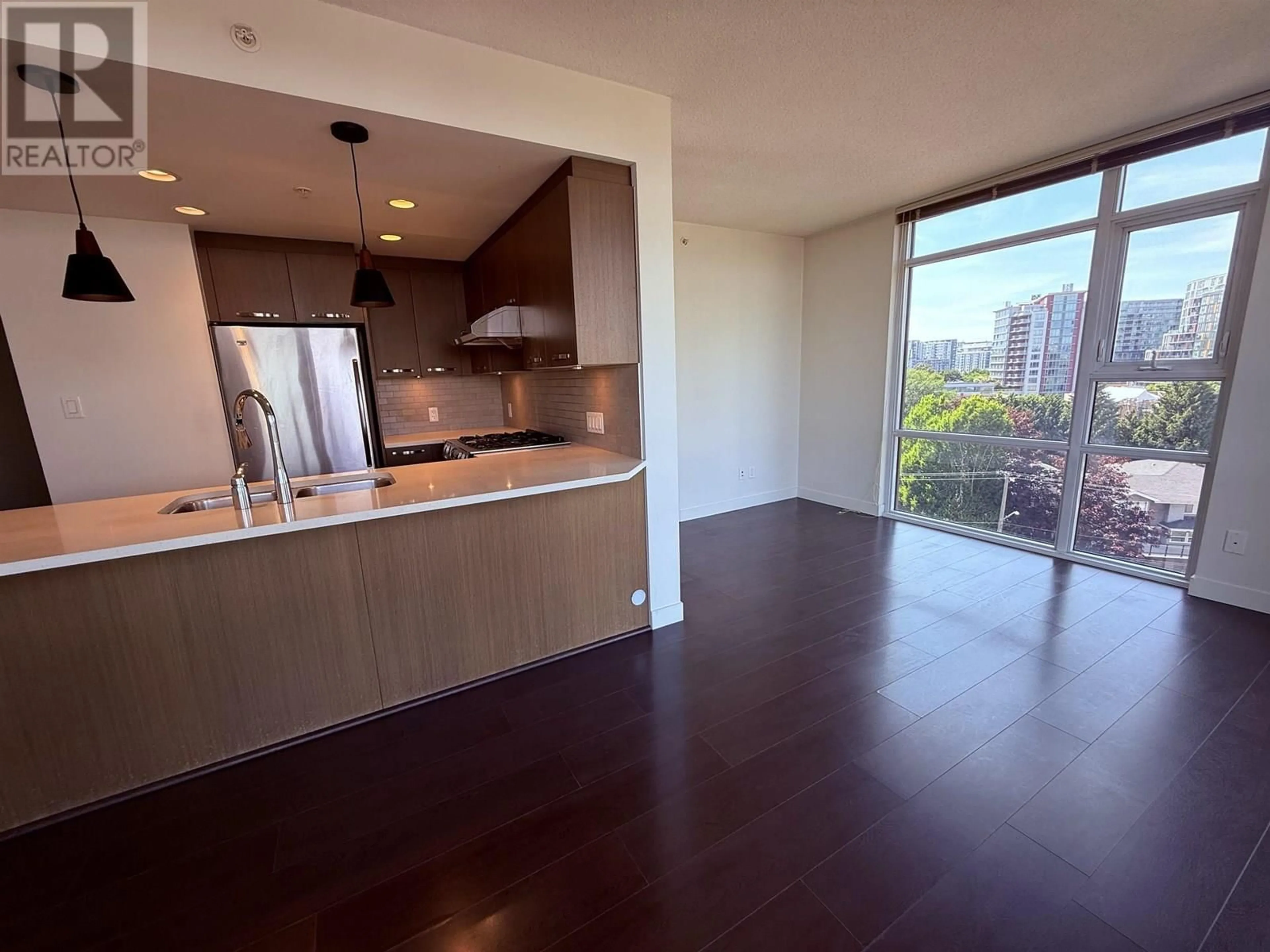Open concept kitchen, wood/laminate floor for 1009 - 8333 ANDERSON ROAD, Richmond British Columbia V6Y0E2