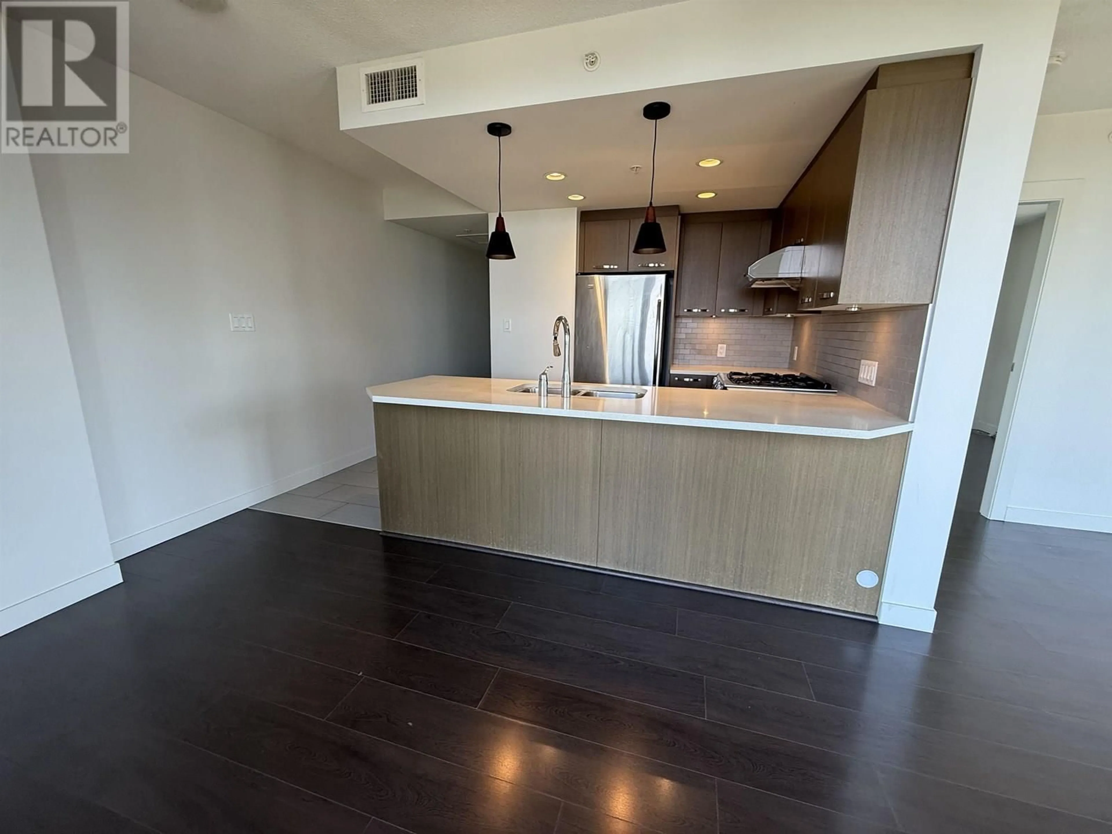 Open concept kitchen, wood/laminate floor for 1009 - 8333 ANDERSON ROAD, Richmond British Columbia V6Y0E2