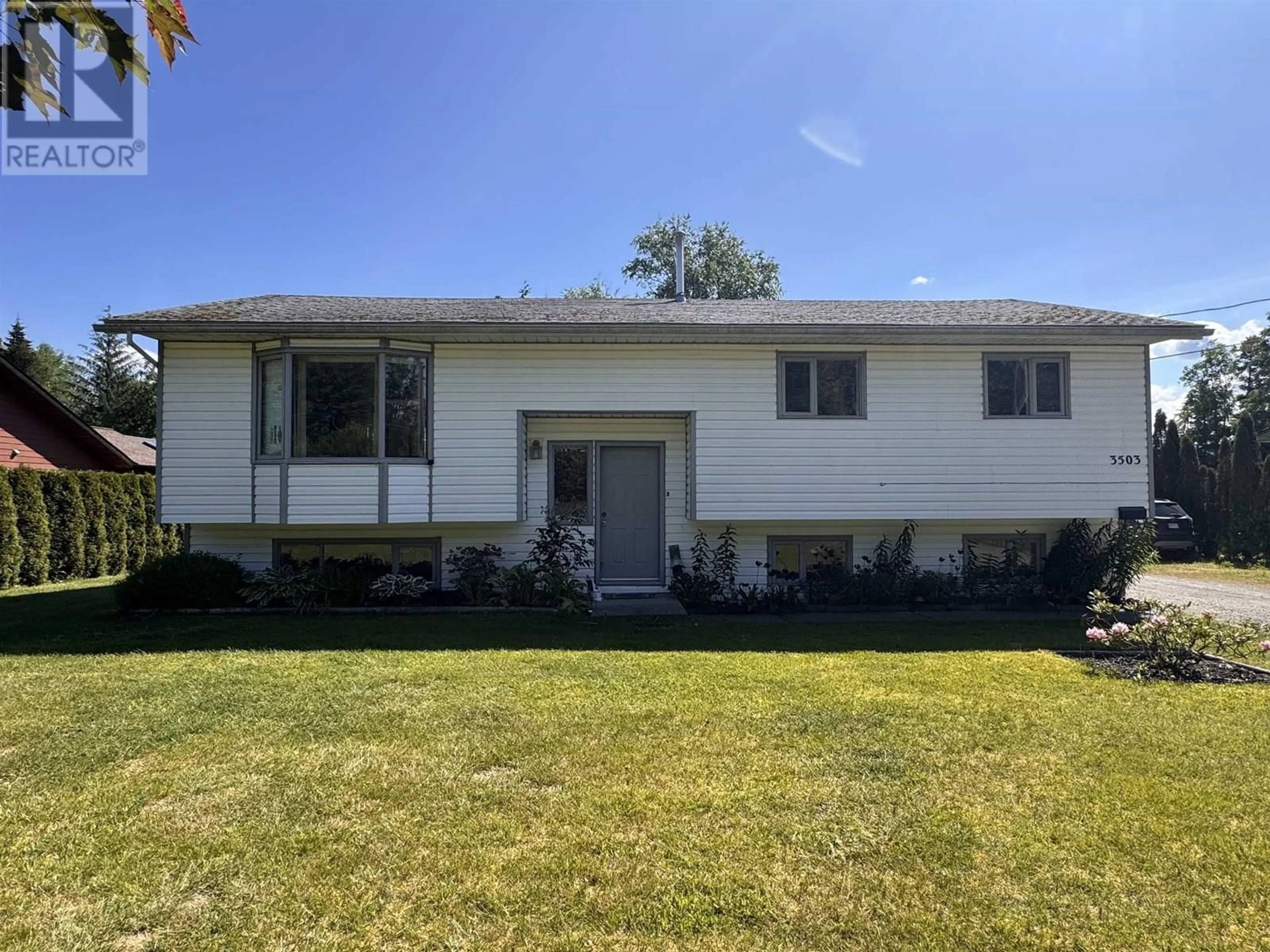 Home with vinyl exterior material, street for 3503 OLD LAKELSE LAKE DRIVE, Terrace British Columbia V8G5J9