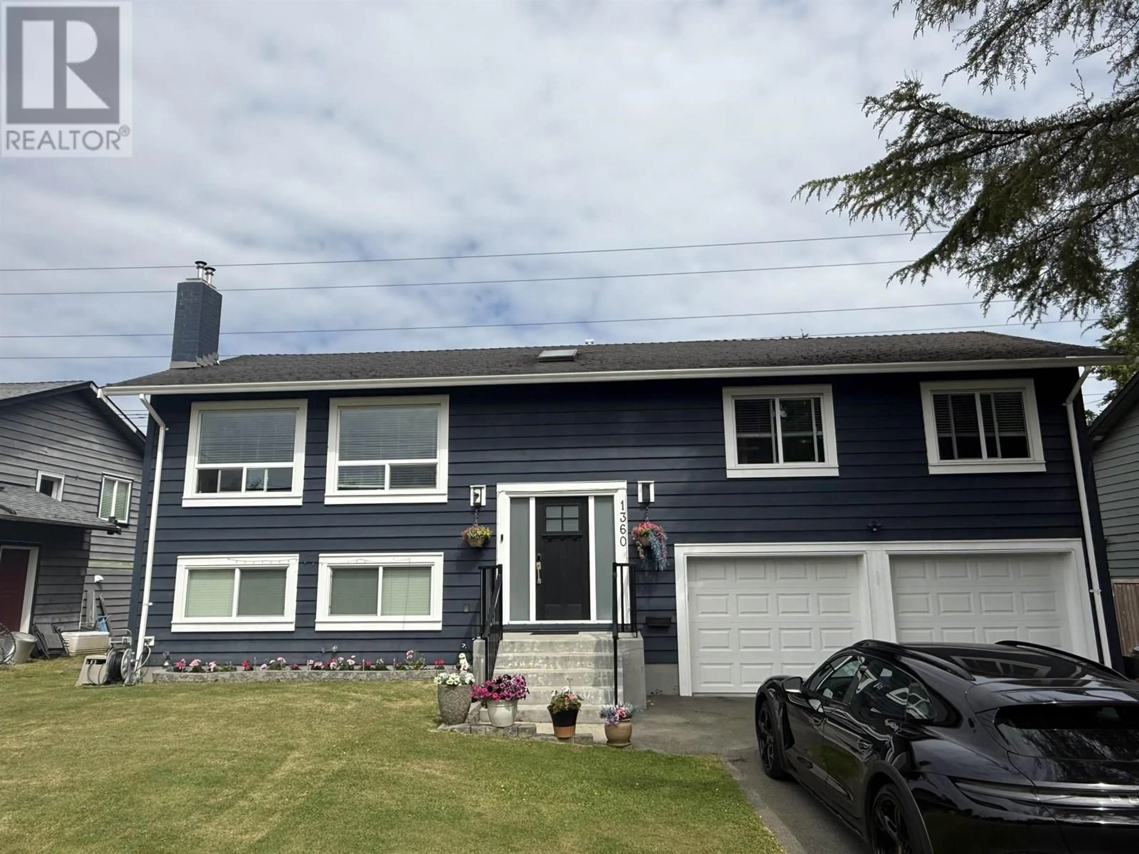 Home with vinyl exterior material, street for 1360 53A STREET, Delta British Columbia V4M3E6