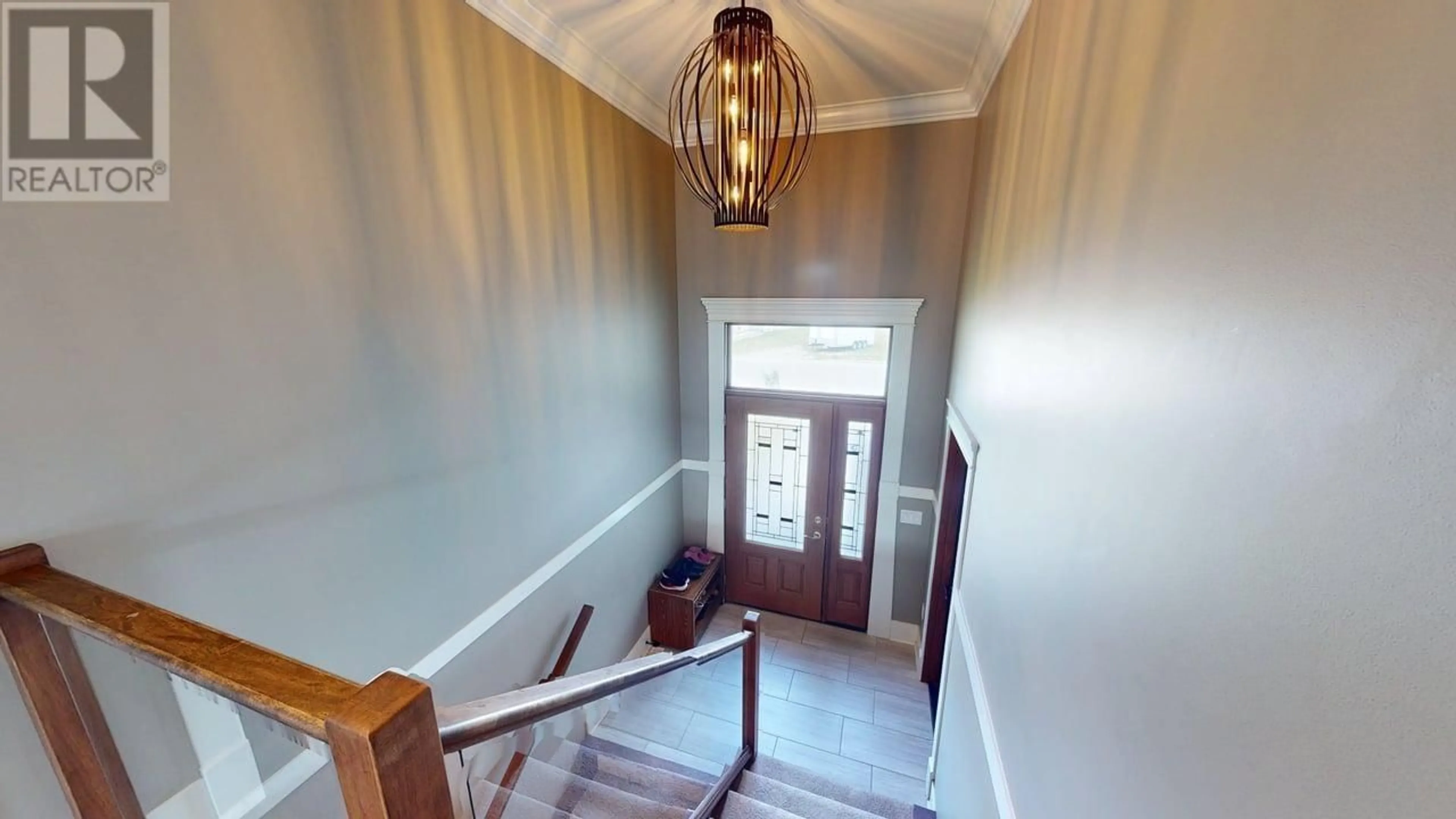 Indoor foyer for 10515 111 STREET, Fort St. John British Columbia V1J0L6