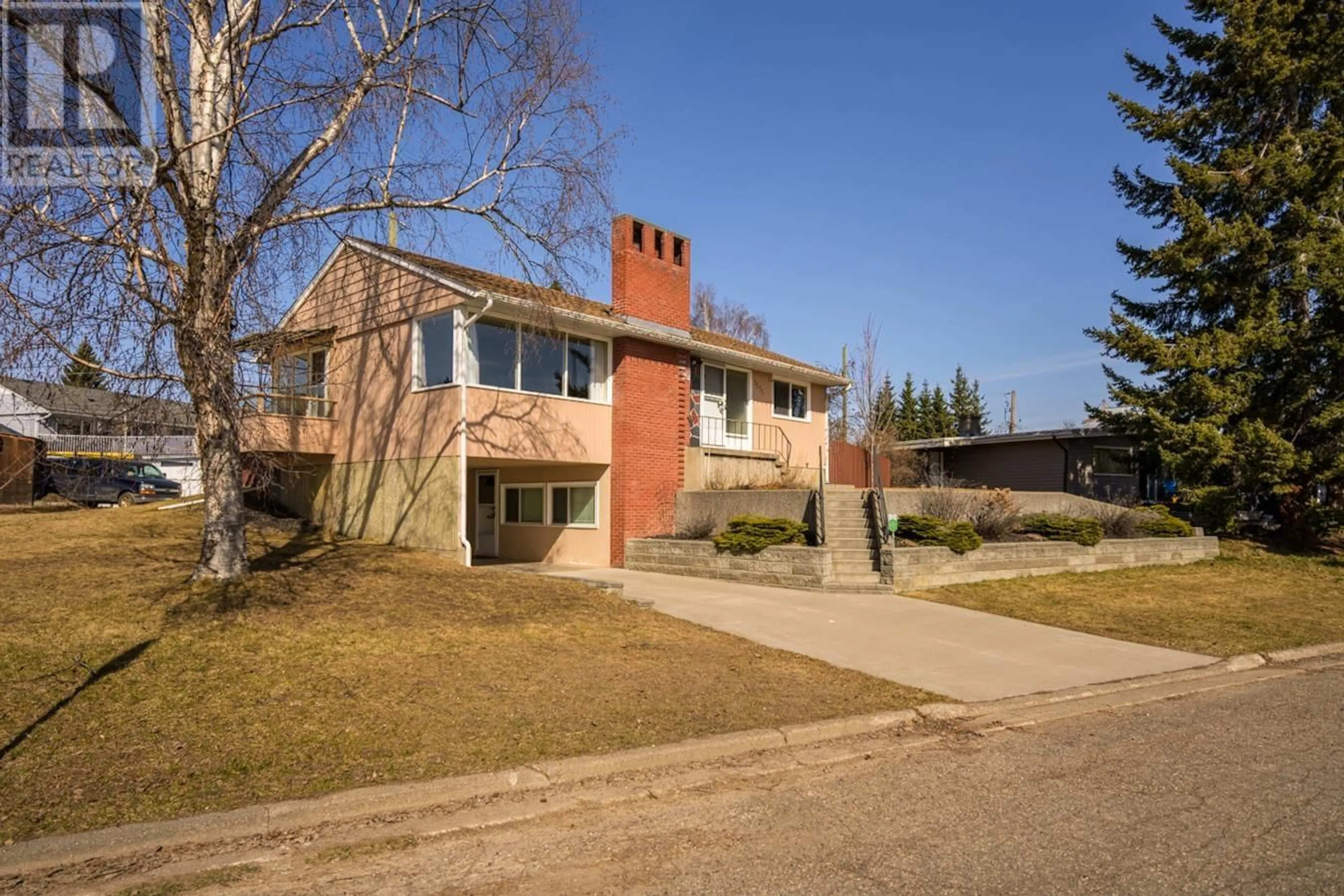 Home with brick exterior material, street for 1573 EDMONTON STREET, Prince George British Columbia V2M1X5