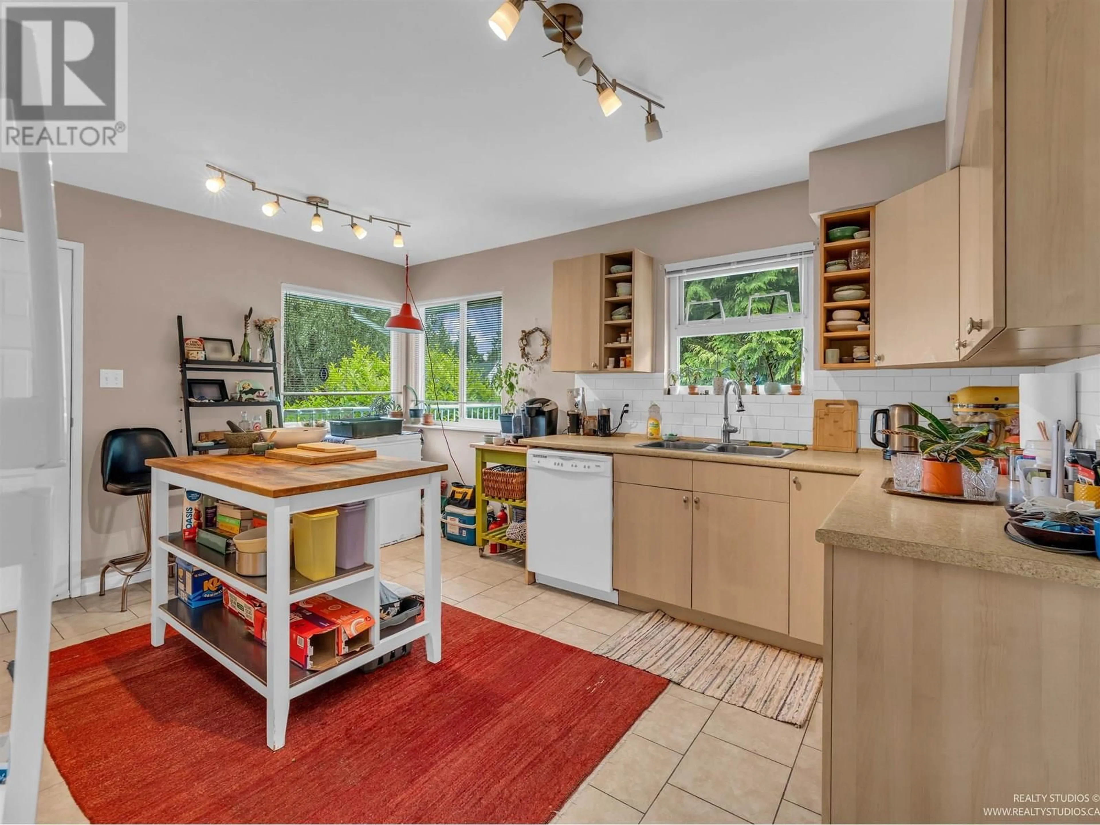 Open concept kitchen, ceramic/tile floor for 4865 11A AVENUE, Delta British Columbia V4M1Z5