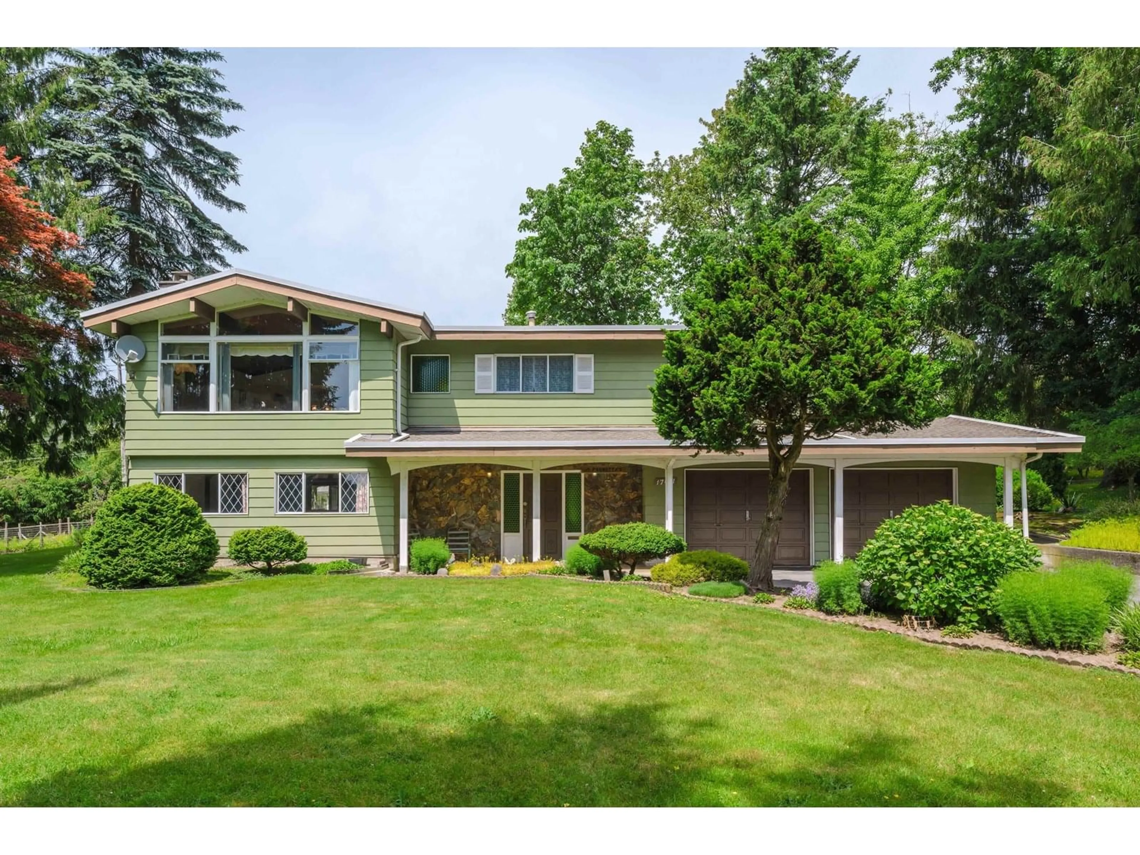 Home with vinyl exterior material, street for 17011 94A, Surrey British Columbia V4N6H2