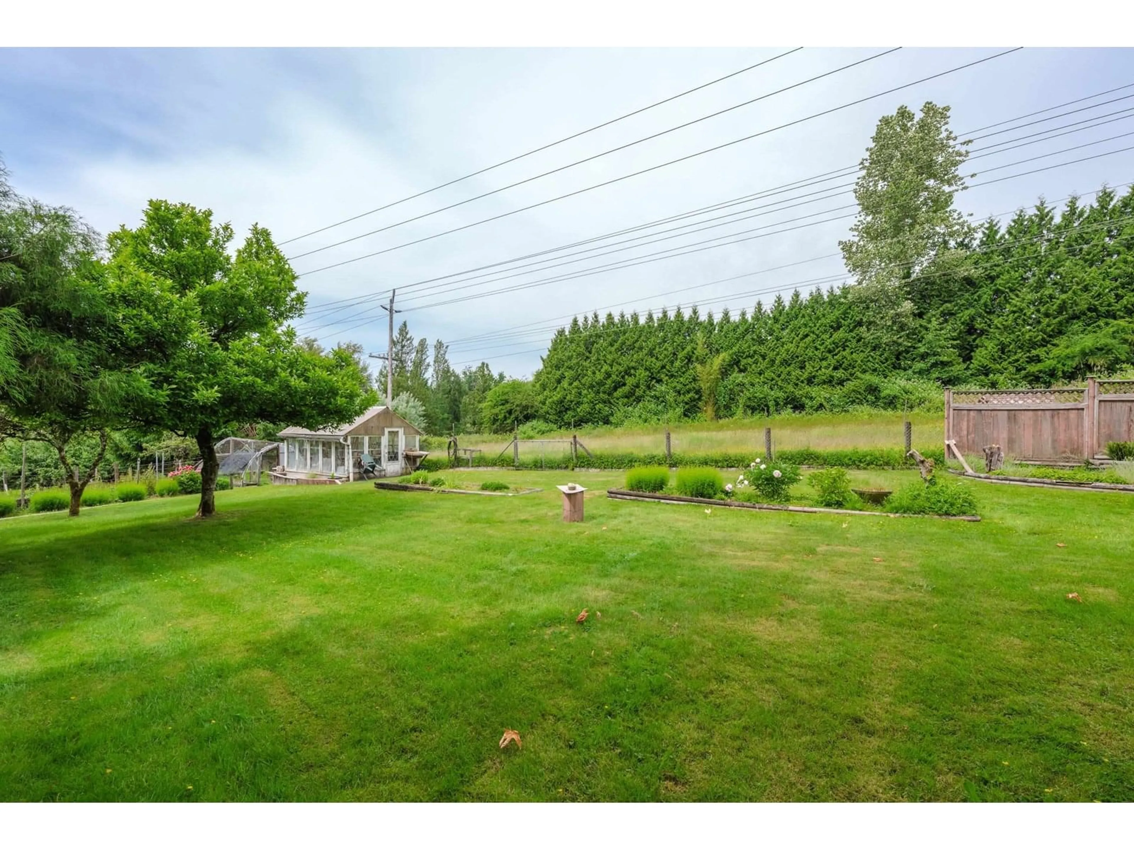 A pic from outside/outdoor area/front of a property/back of a property/a pic from drone, water/lake/river/ocean view for 17011 94A, Surrey British Columbia V4N6H2