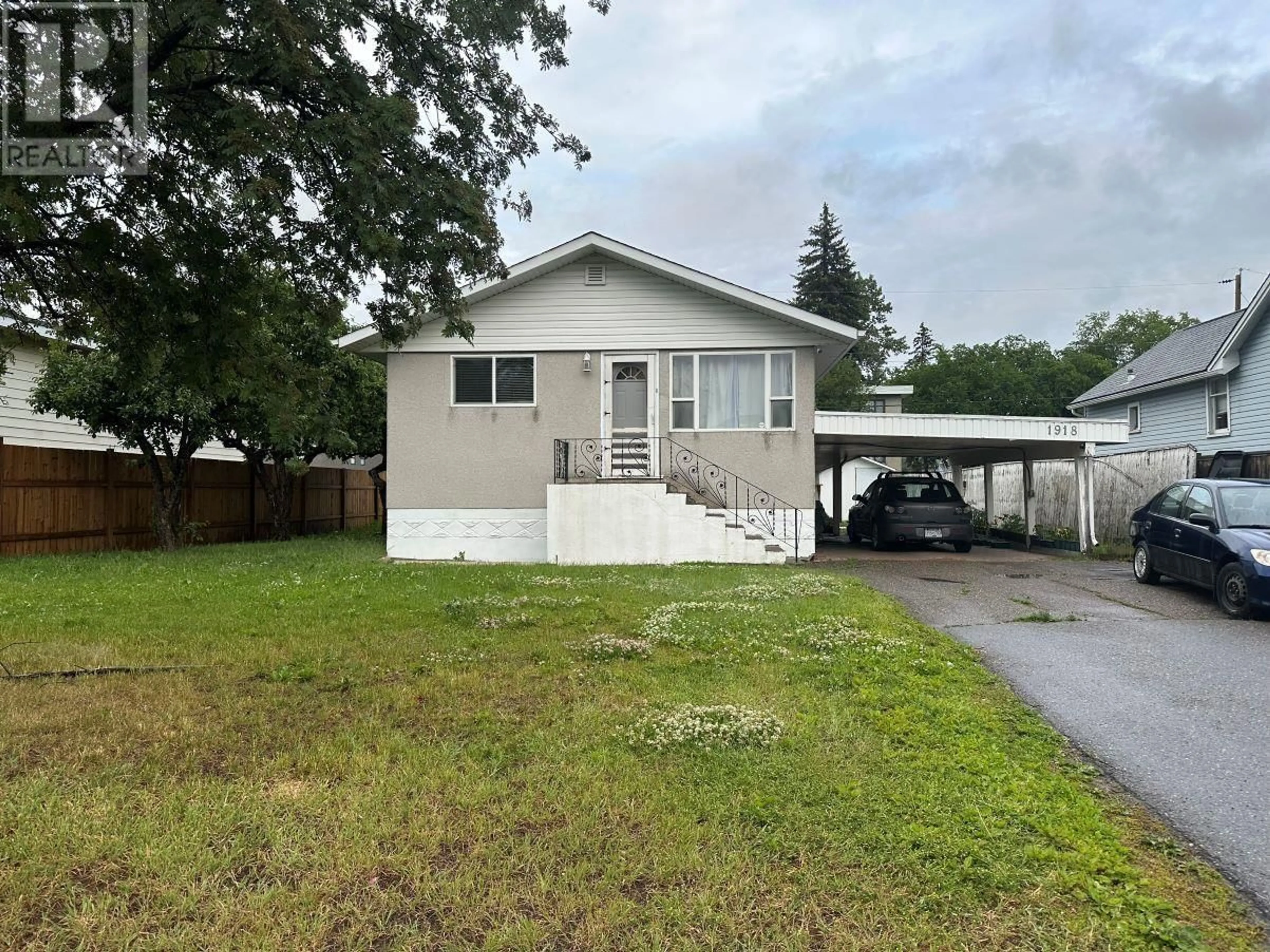 Home with vinyl exterior material, street for 1918 VINE STREET, Prince George British Columbia V2L2W8