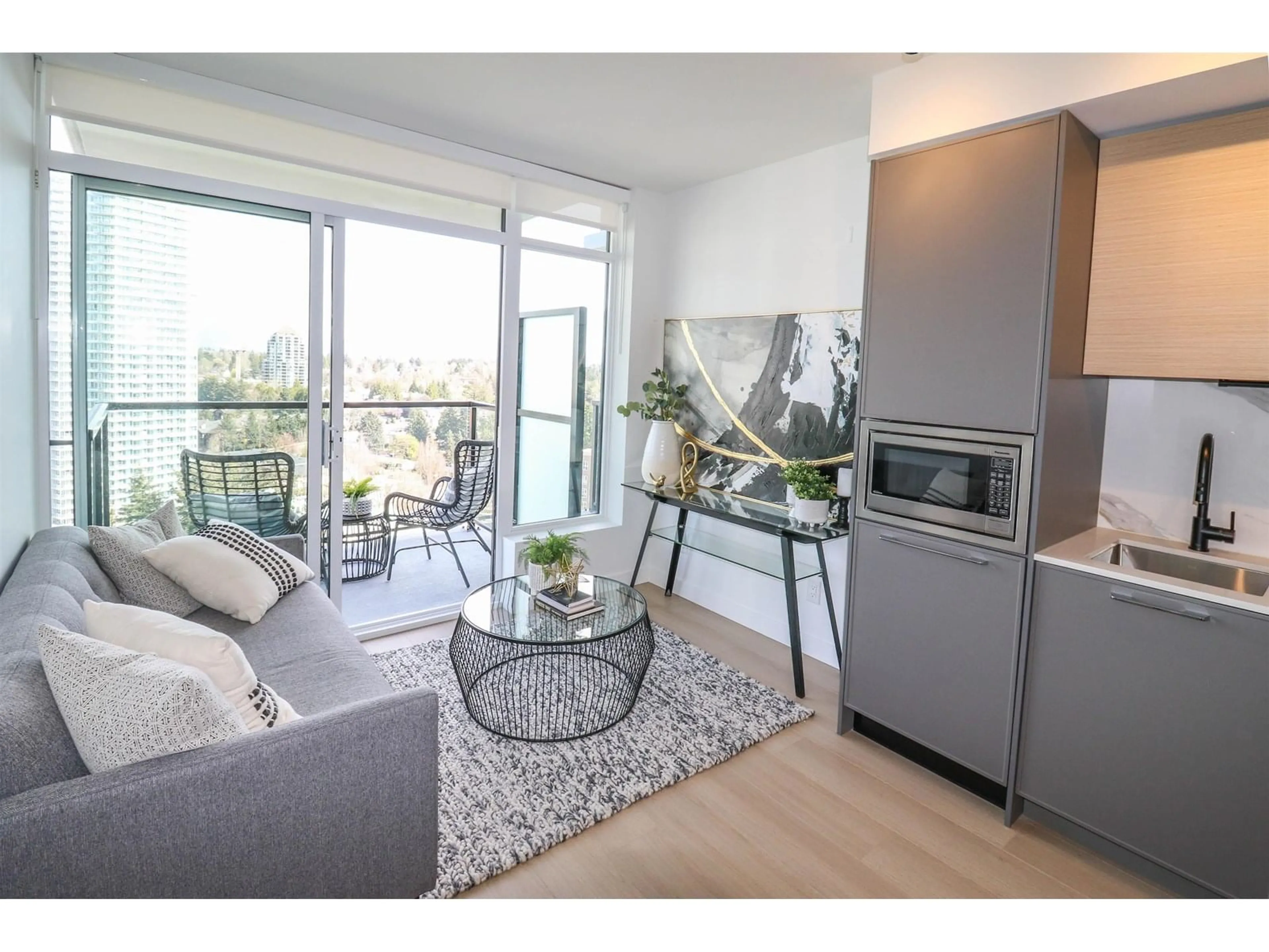 Living room with furniture, wood/laminate floor for 2107 - 13725 GEORGE JUNCTION, Surrey British Columbia V3T0R1