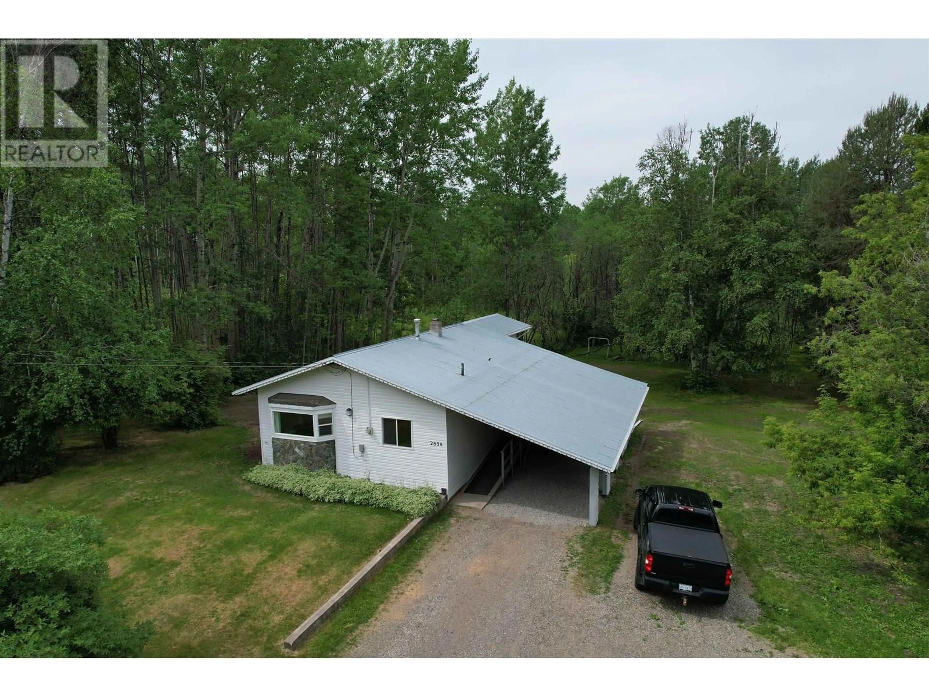 A pic from outside/outdoor area/front of a property/back of a property/a pic from drone, building for 2838 RED BLUFF ROAD, Quesnel British Columbia V2J6C7