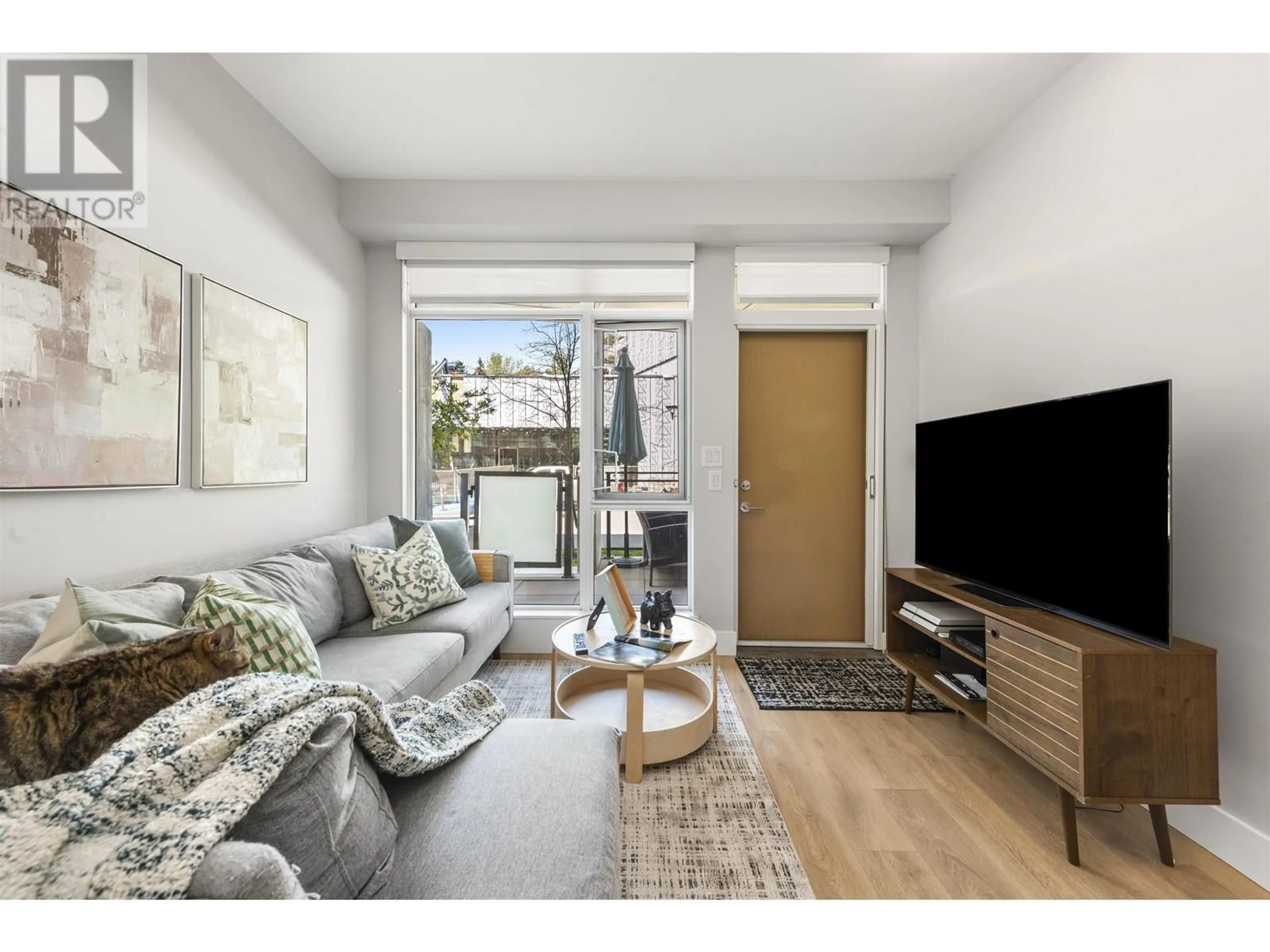 Living room with furniture, wood/laminate floor for 3574 SAWMILL CRESCENT, Vancouver British Columbia V5S0H5