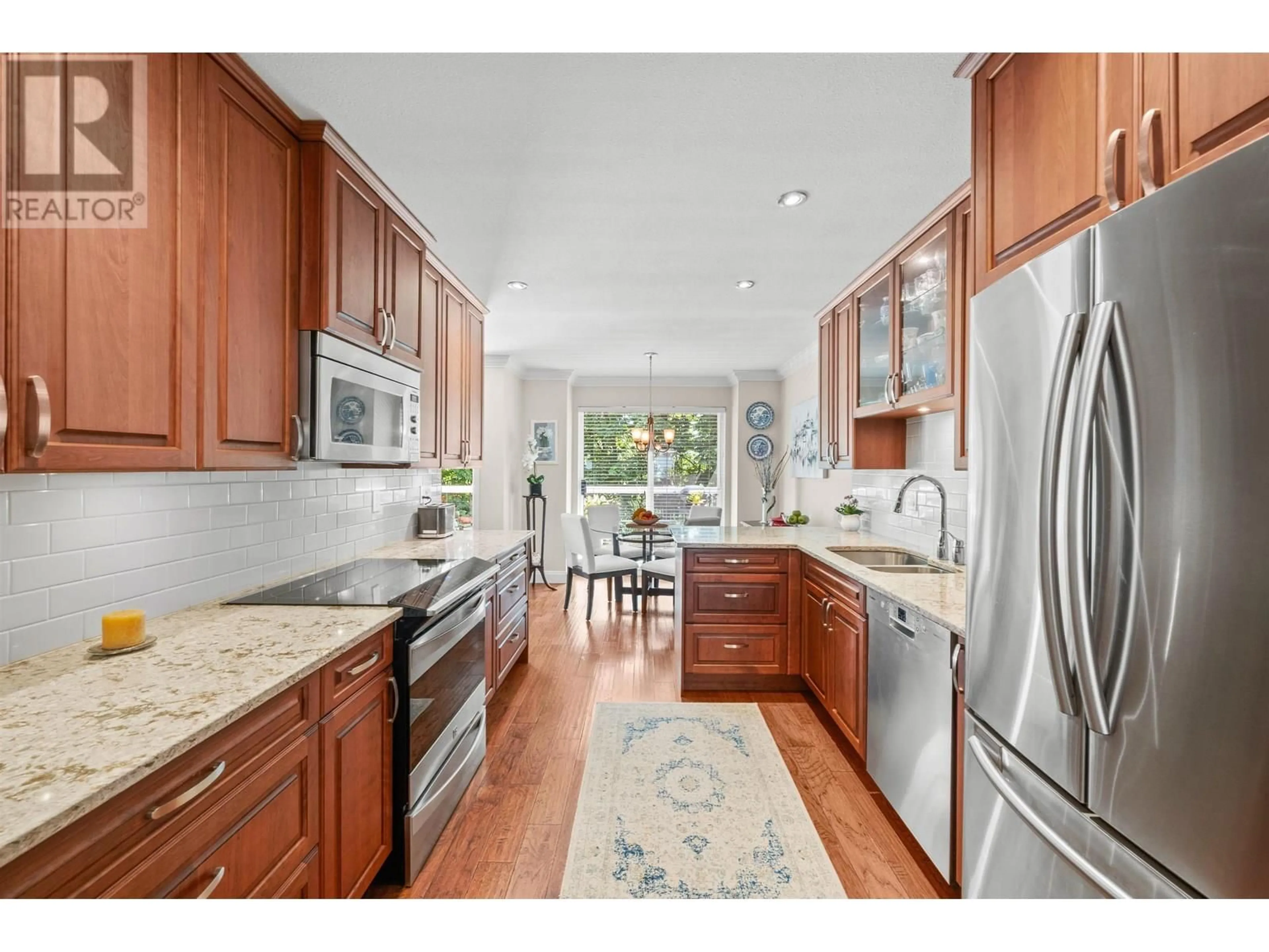 Open concept kitchen, ceramic/tile floor for 12 - 72 JAMIESON COURT, New Westminster British Columbia V3L5R6