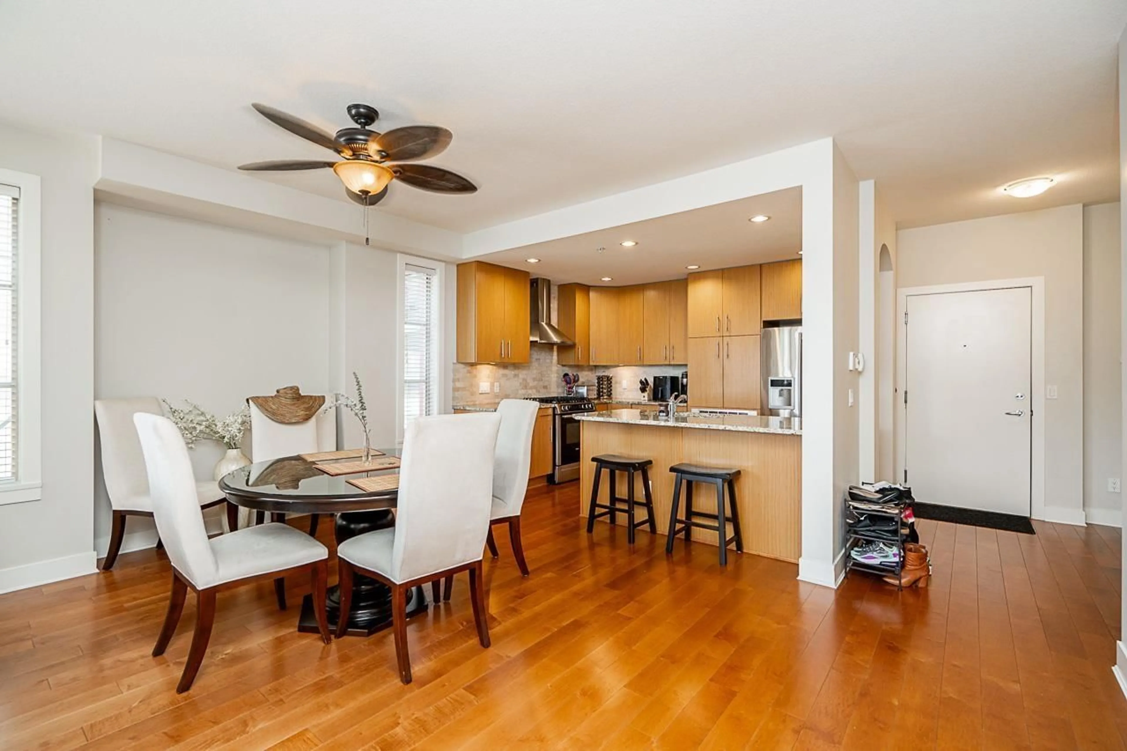 Open concept kitchen, wood/laminate floor for 204 - 16469 64, Surrey British Columbia V3S6V7