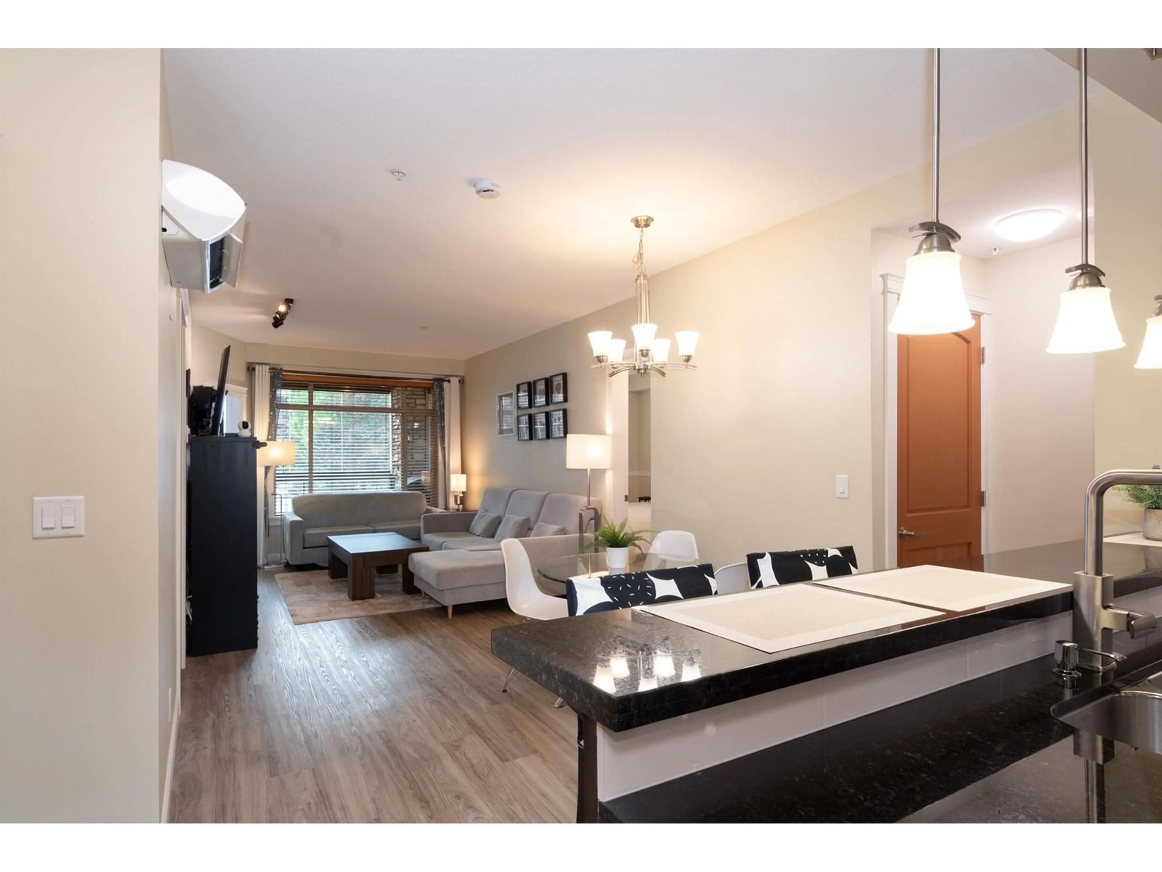 Living room with furniture, wood/laminate floor for 282 - 8288 207A, Langley British Columbia V2Y0L2