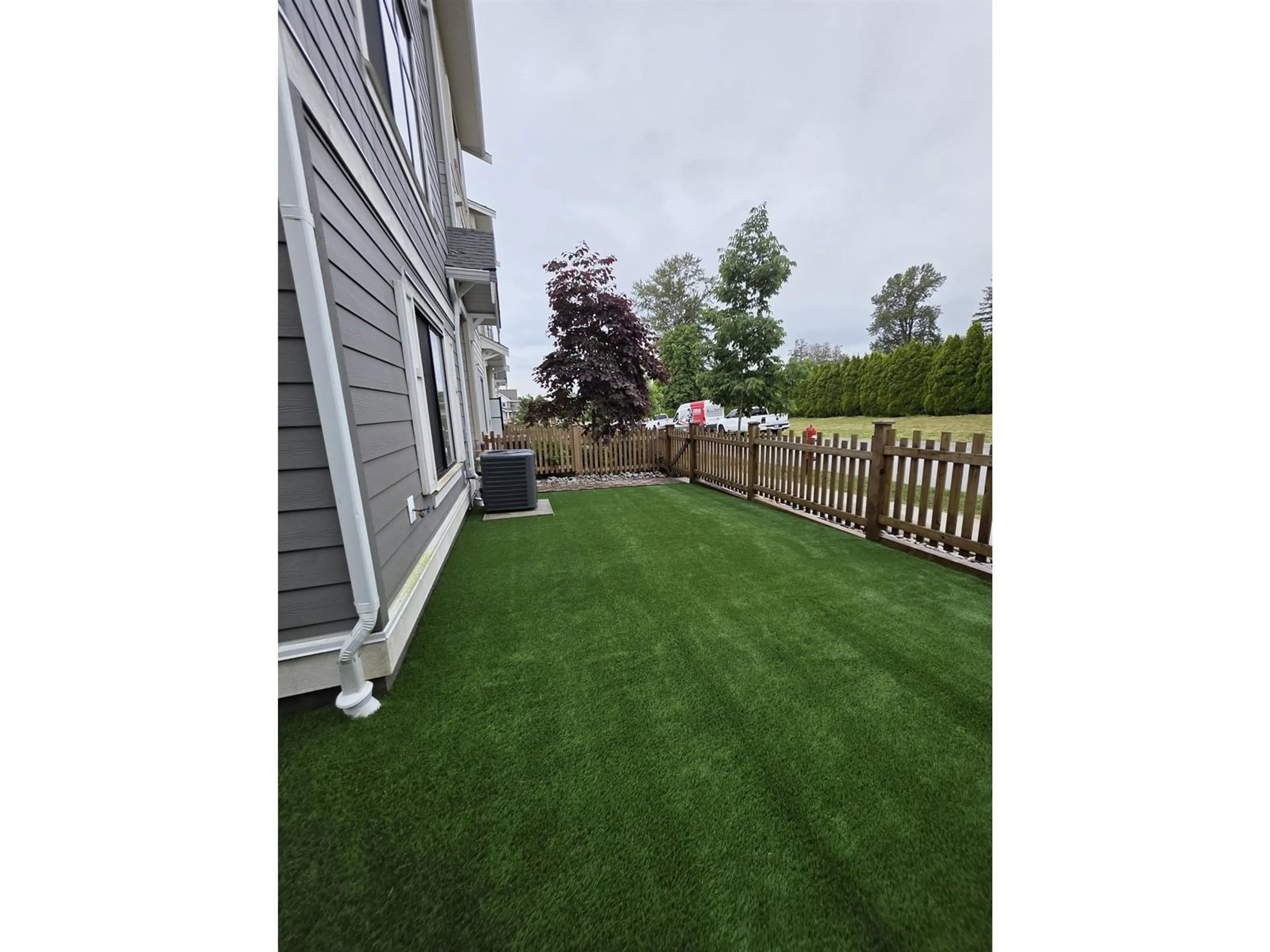 A pic from outside/outdoor area/front of a property/back of a property/a pic from drone, street for 18 - 20261 72B, Langley British Columbia V2Y3M8