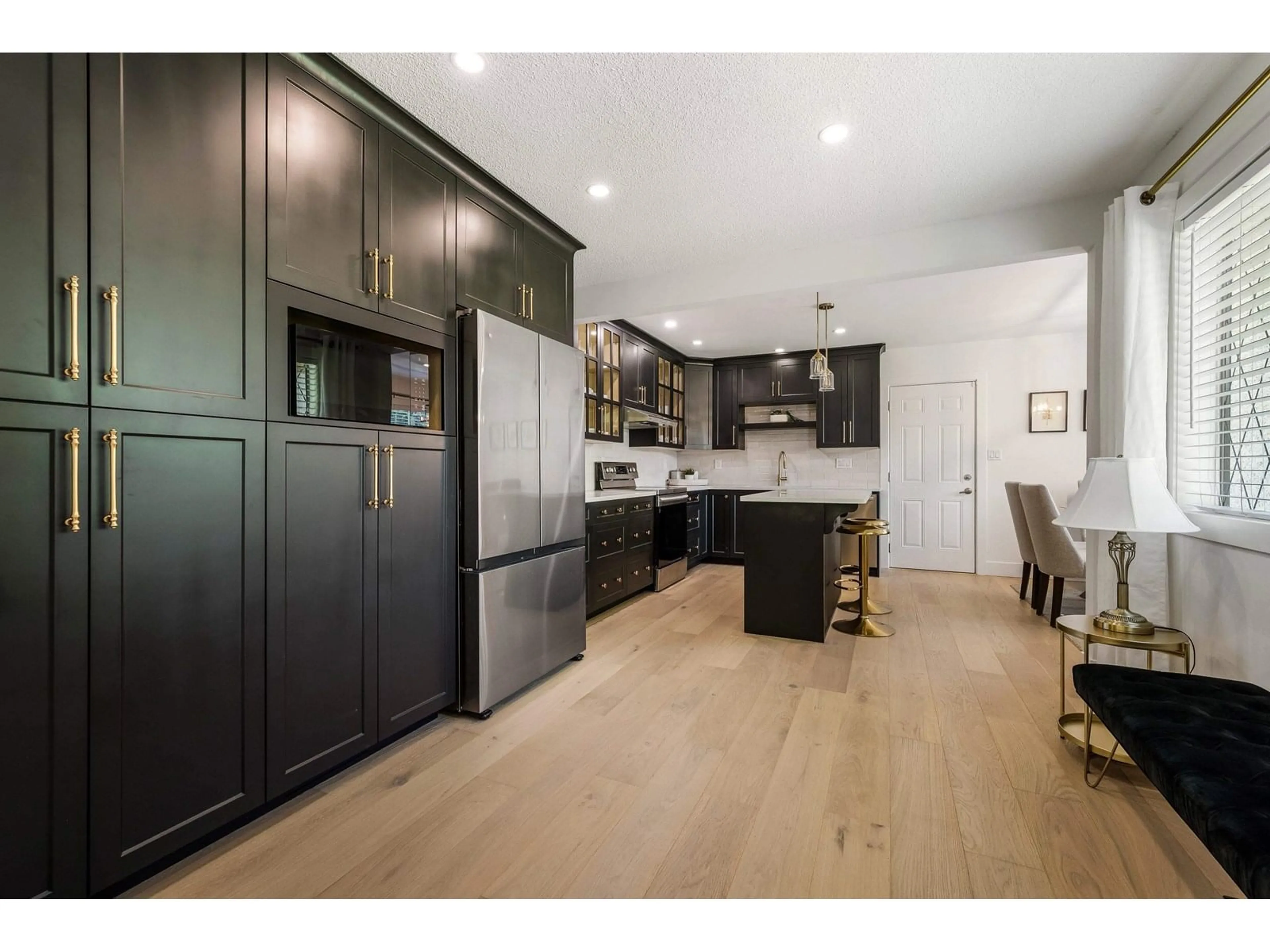 Open concept kitchen, wood/laminate floor for 46672 YALE ROAD, Chilliwack British Columbia V2P2R9