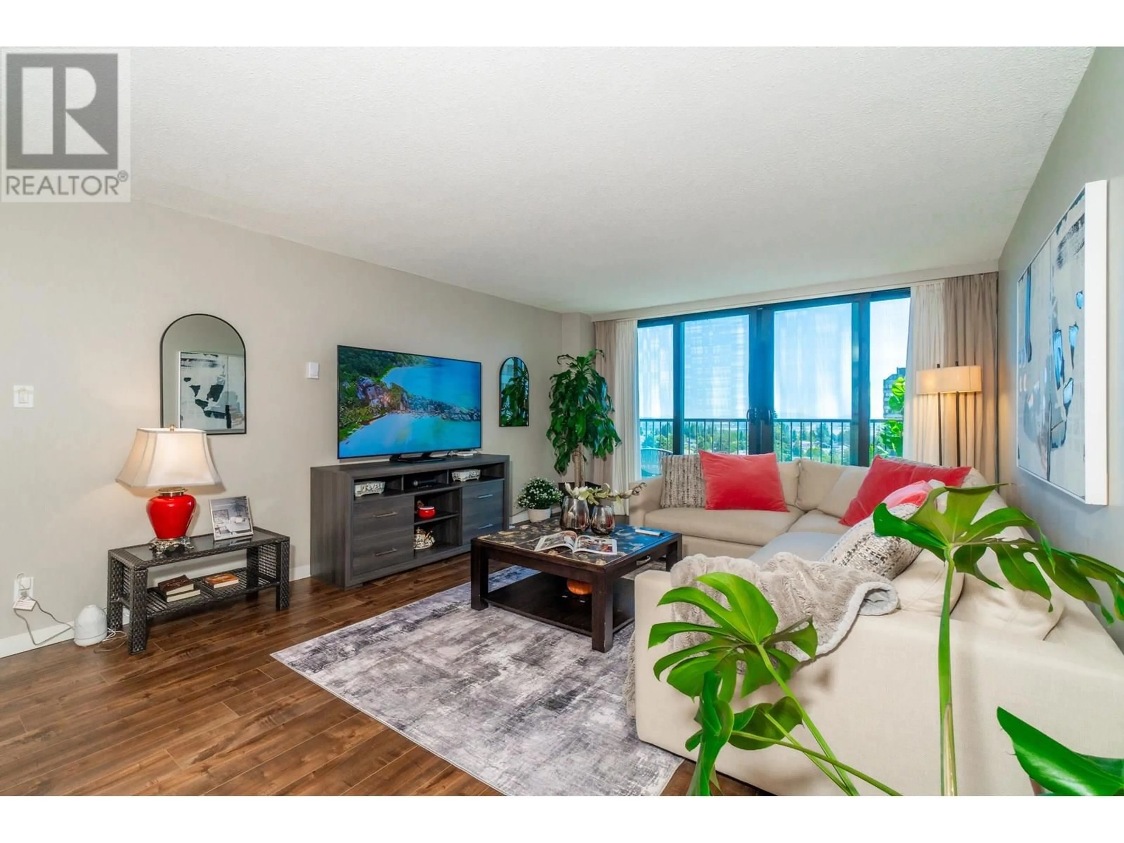 Living room with furniture, wood/laminate floor for 1405 - 4165 MAYWOOD STREET, Burnaby British Columbia V5H4E3