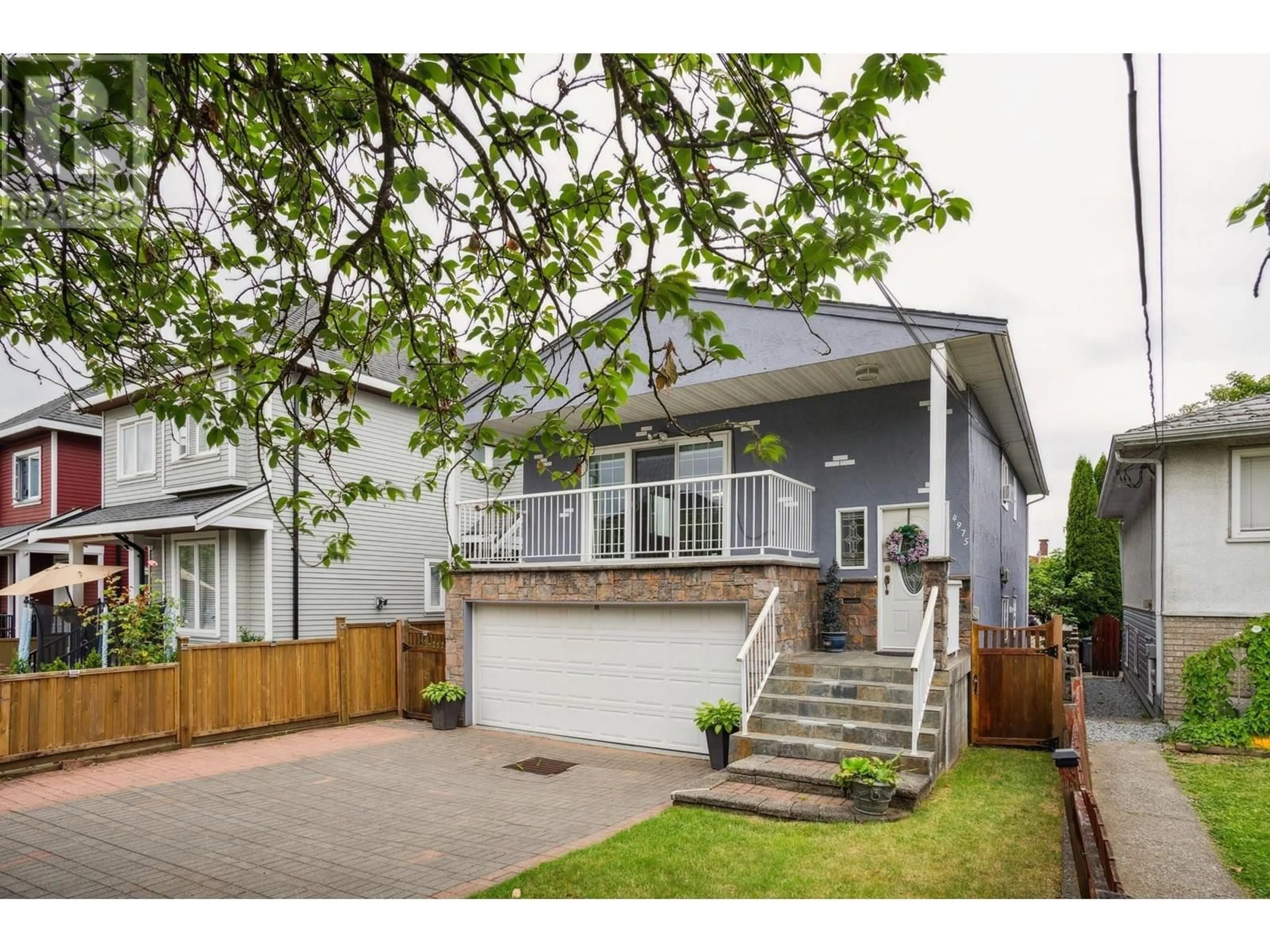 Home with vinyl exterior material, street for 4975 MOSS STREET, Vancouver British Columbia V5R3T5