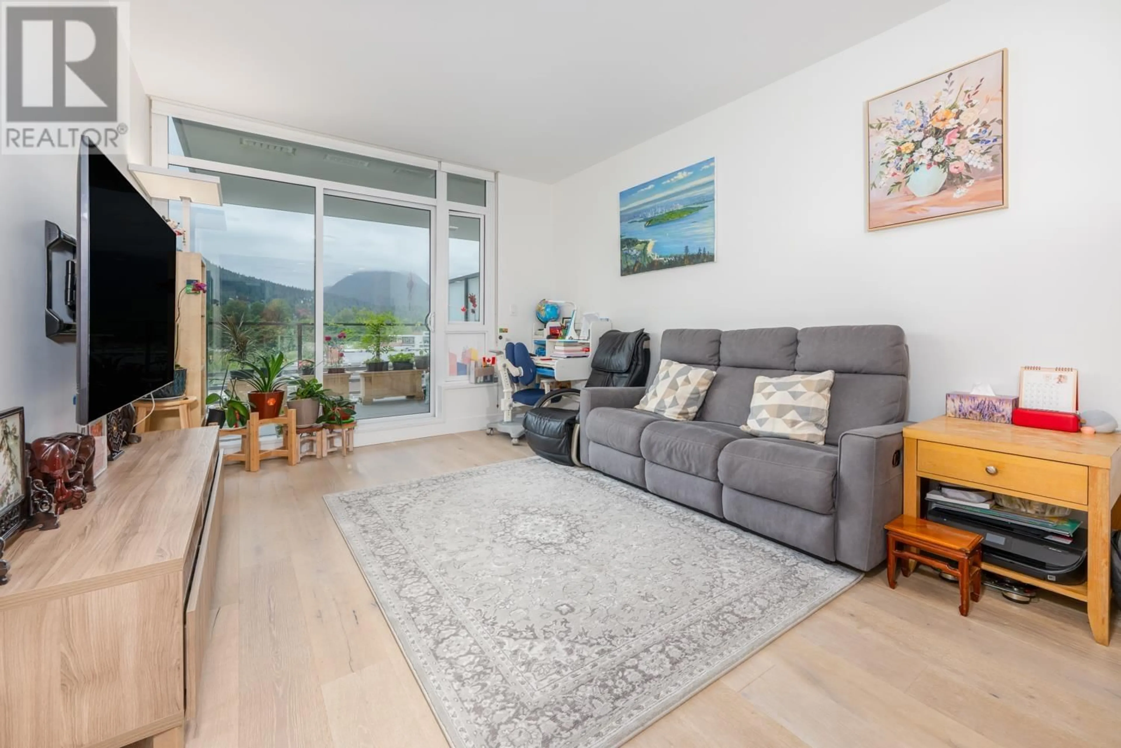 Living room with furniture, unknown for 510 - 2780 VALLEY CENTRE AVENUE, North Vancouver British Columbia V7J0C4