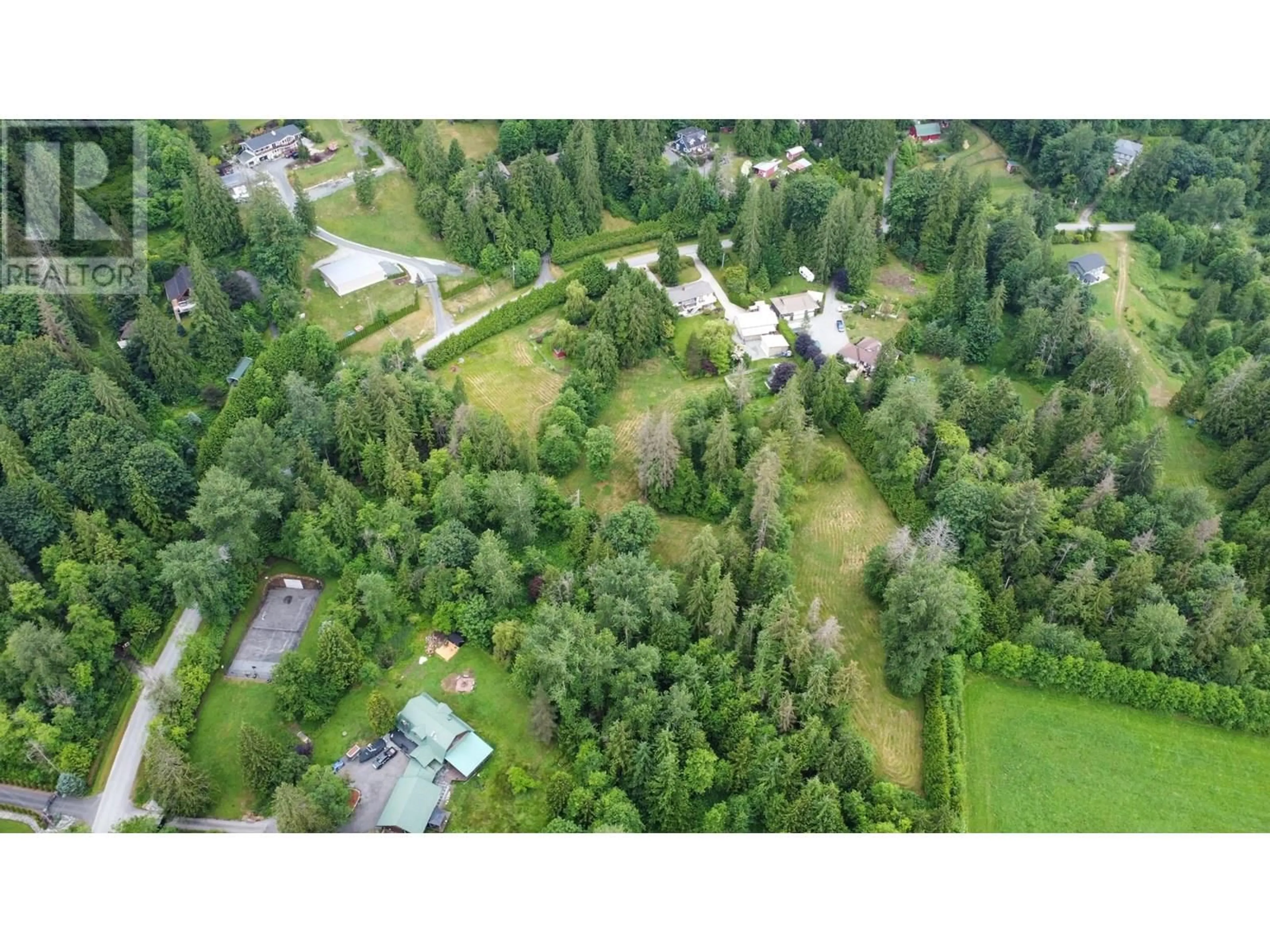 A pic from outside/outdoor area/front of a property/back of a property/a pic from drone, forest/trees view for 26651 CUNNINGHAM AVENUE, Maple Ridge British Columbia V2W1M8