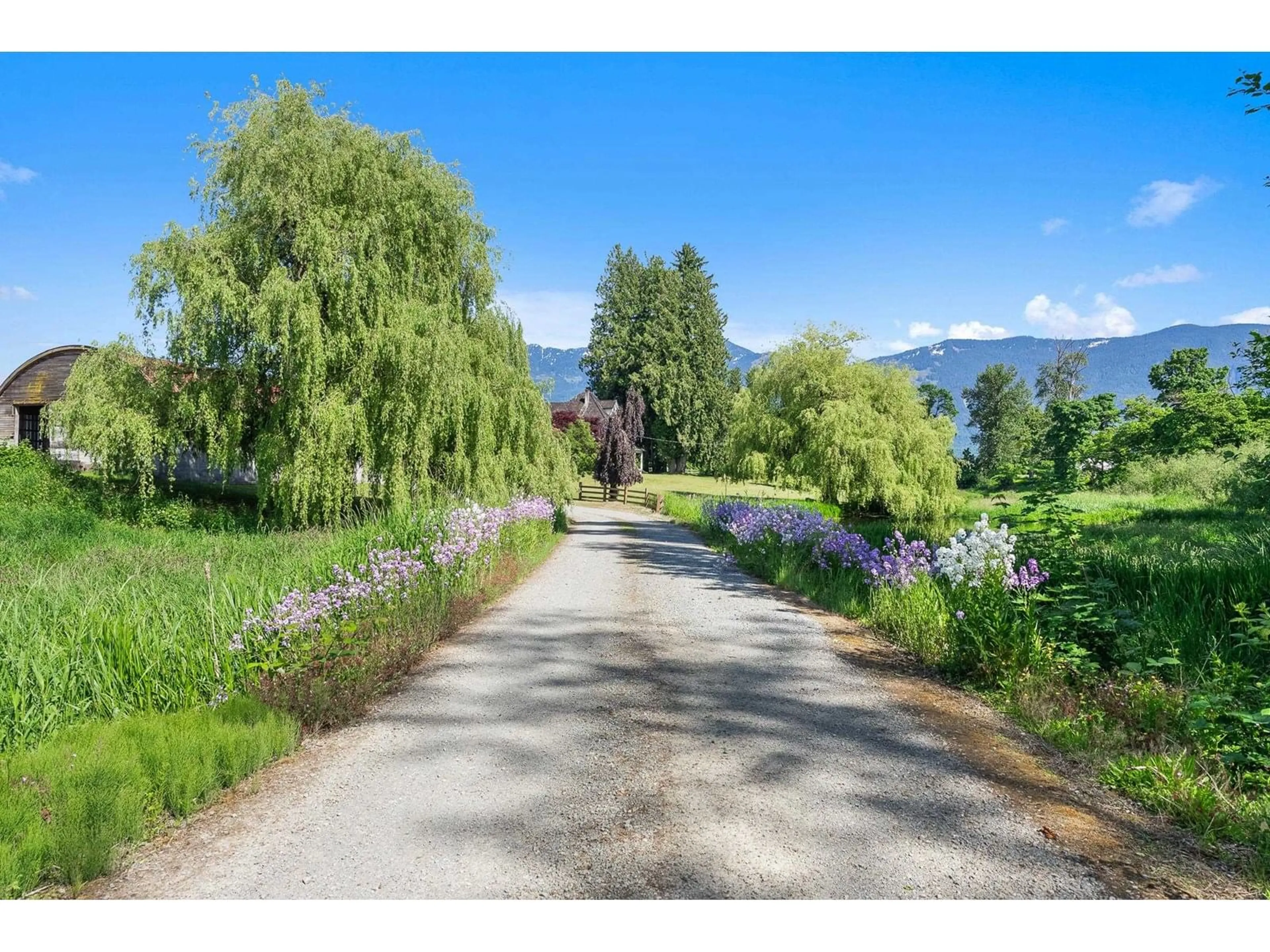 A pic from outside/outdoor area/front of a property/back of a property/a pic from drone, mountain view for 49585 CAMP RIVER ROAD, Chilliwack British Columbia V2P6H4