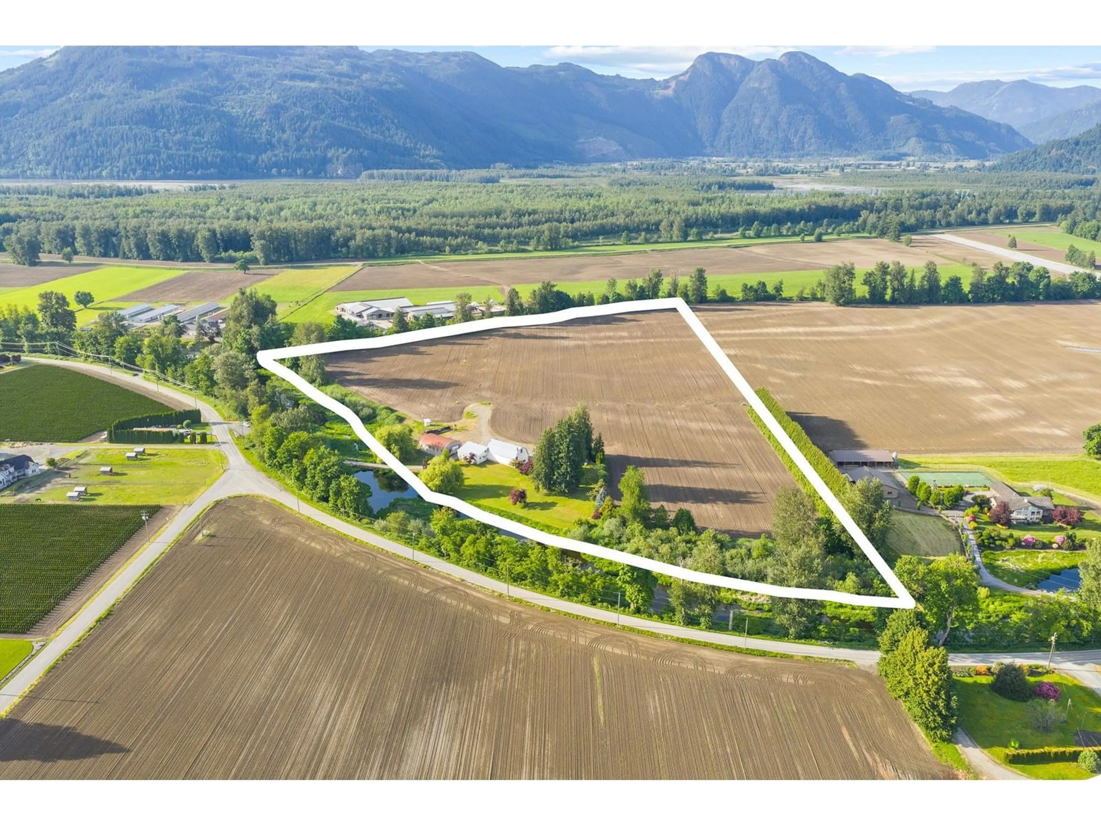 A pic from outside/outdoor area/front of a property/back of a property/a pic from drone, mountain view for 49585 CAMP RIVER ROAD, Chilliwack British Columbia V2P6H4