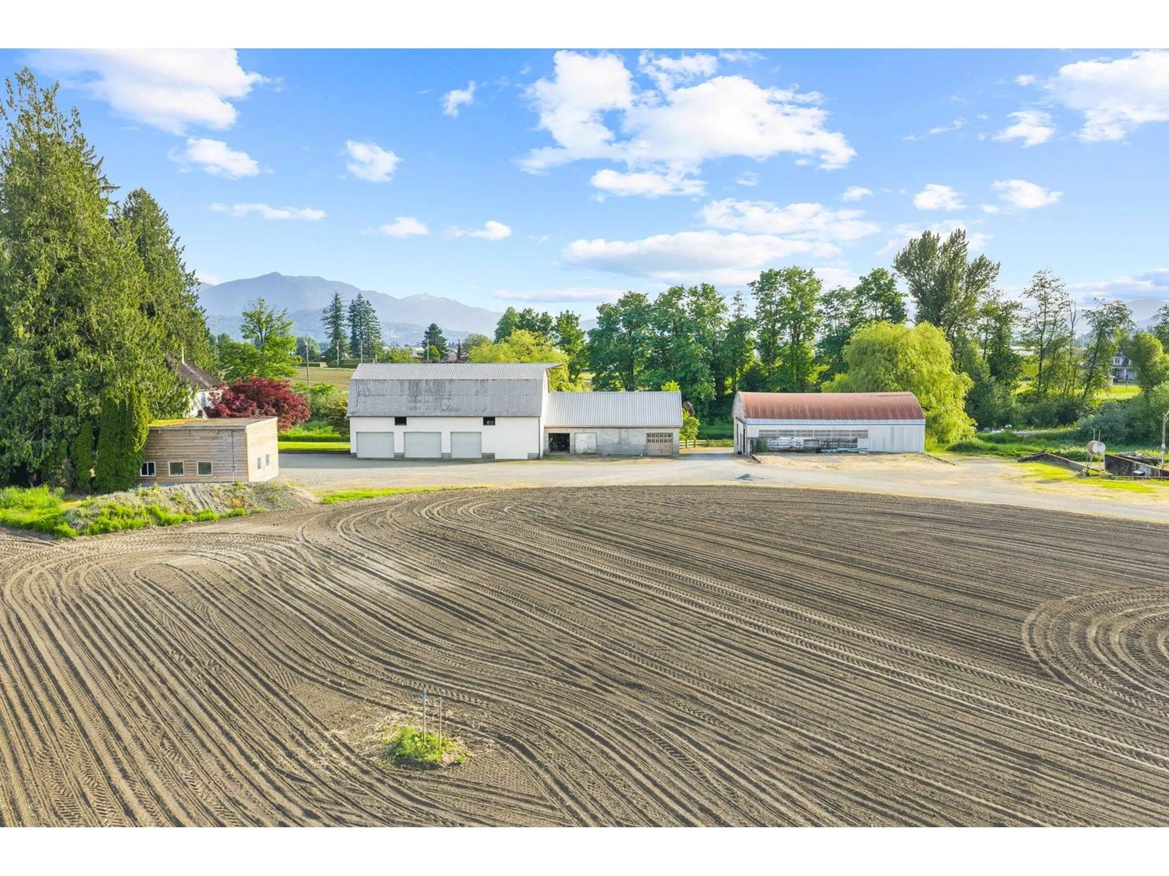 A pic from outside/outdoor area/front of a property/back of a property/a pic from drone, unknown for 49585 CAMP RIVER ROAD, Chilliwack British Columbia V2P6H4