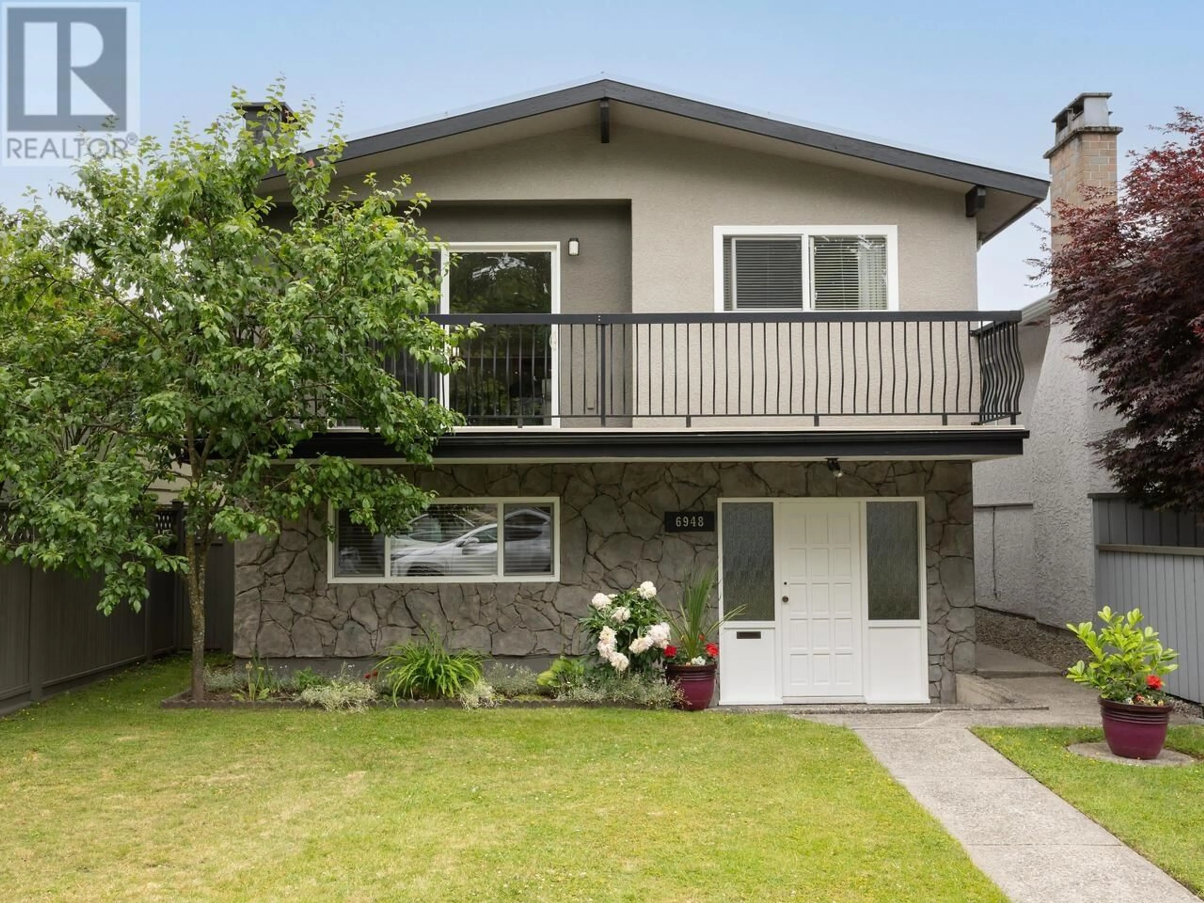 Home with vinyl exterior material, street for 6948 SPERLING AVENUE, Burnaby British Columbia V5E2W2