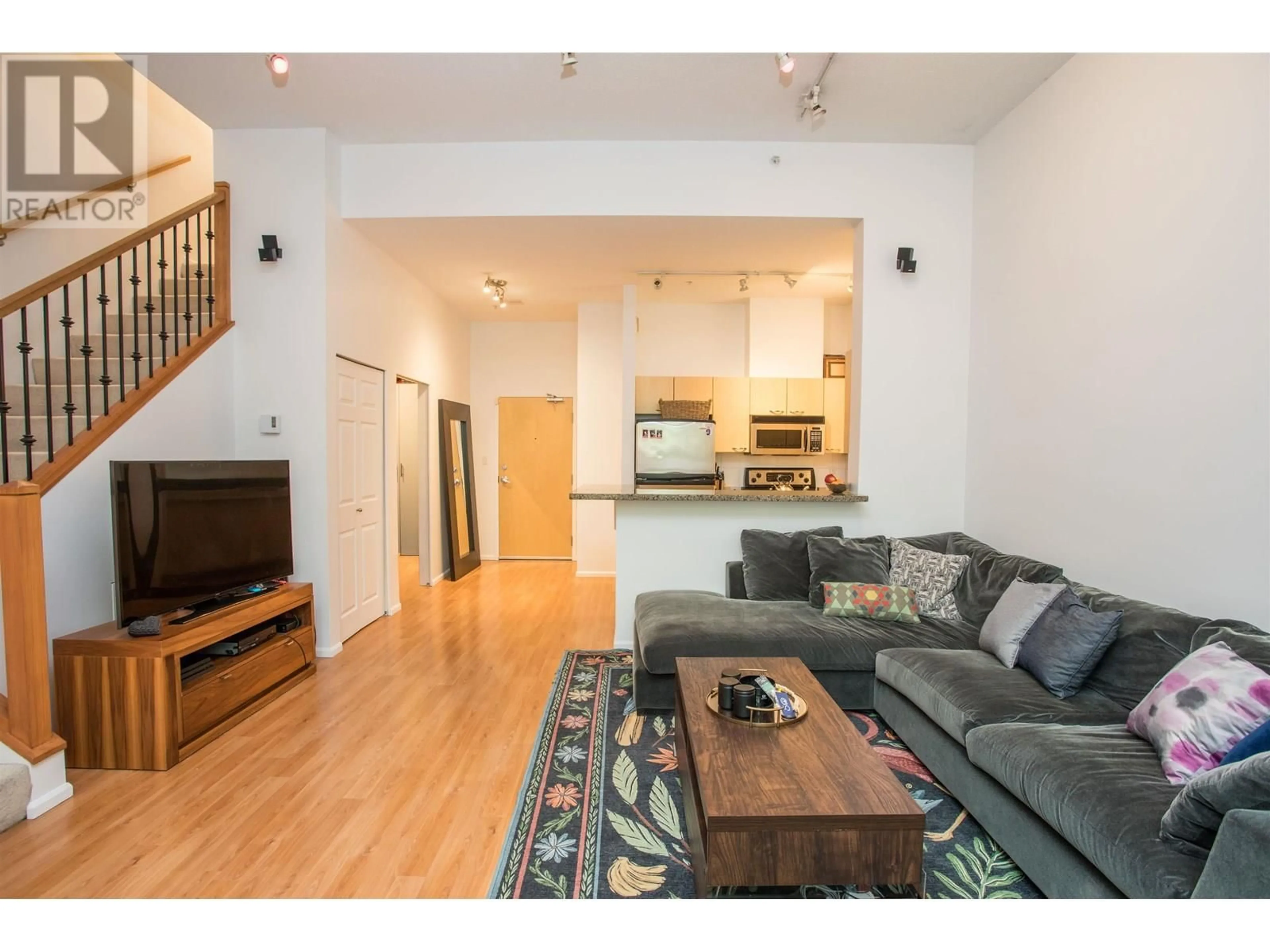 Living room with furniture, wood/laminate floor for TH8 - 707 BROUGHTON STREET, Vancouver British Columbia V6G3K5