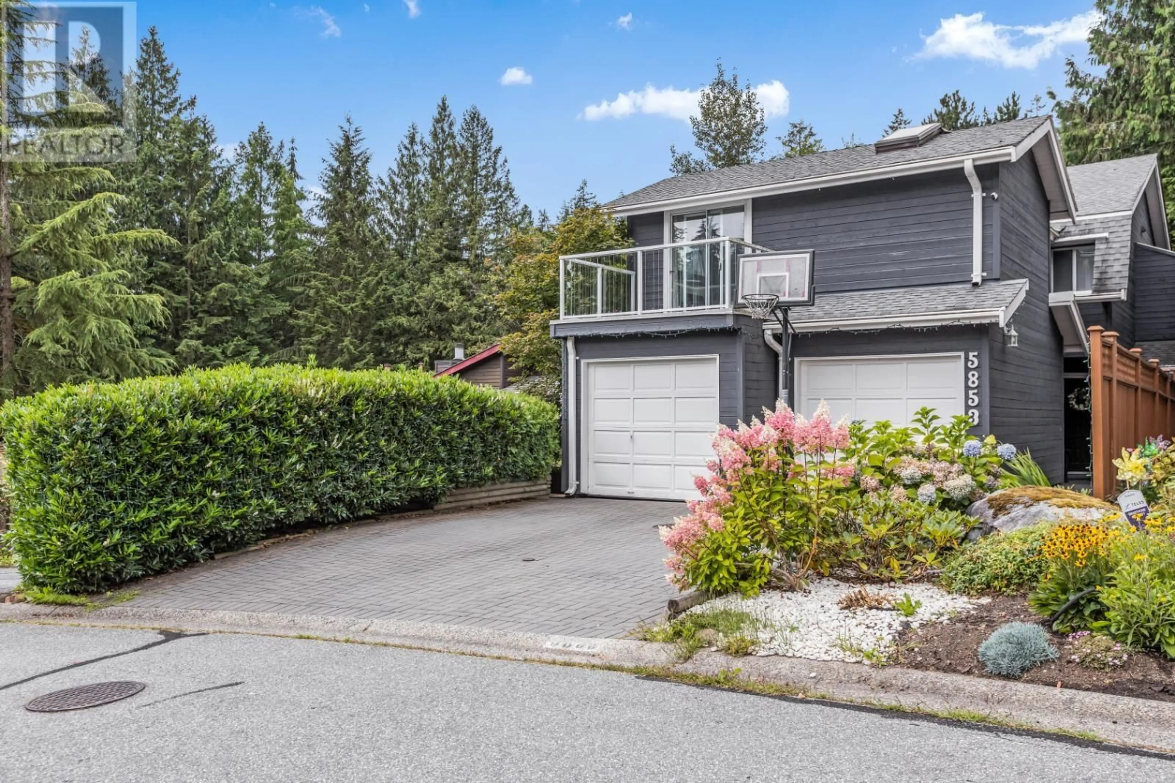Home with vinyl exterior material, street for 5853 GROUSEWOODS CRESCENT, North Vancouver British Columbia V7R4V3