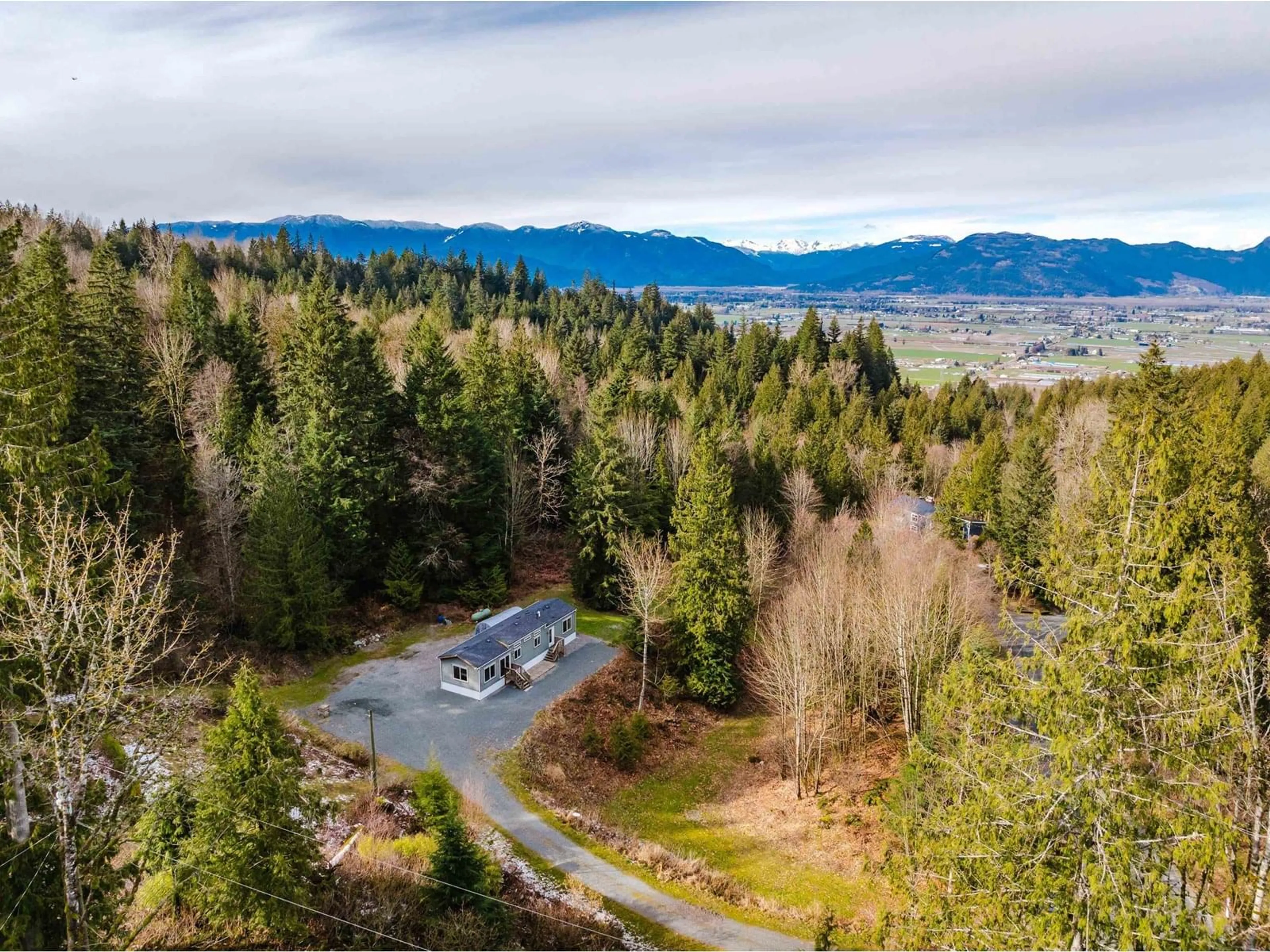 A pic from outside/outdoor area/front of a property/back of a property/a pic from drone, forest/trees view for 6650 HINKLEY ROAD, Chilliwack British Columbia V4Z1J4