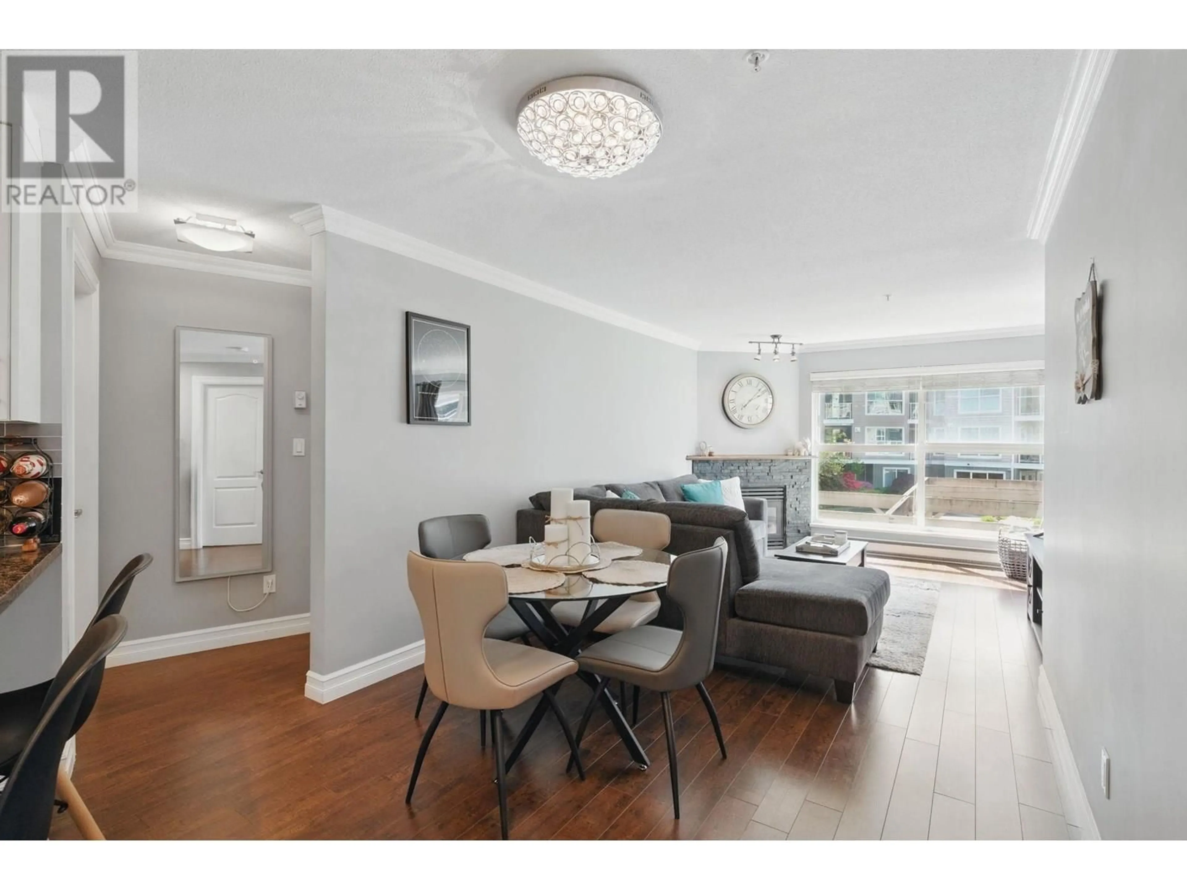 Living room with furniture, wood/laminate floor for 223 - 5880 DOVER CRESCENT, Richmond British Columbia V7C5P5