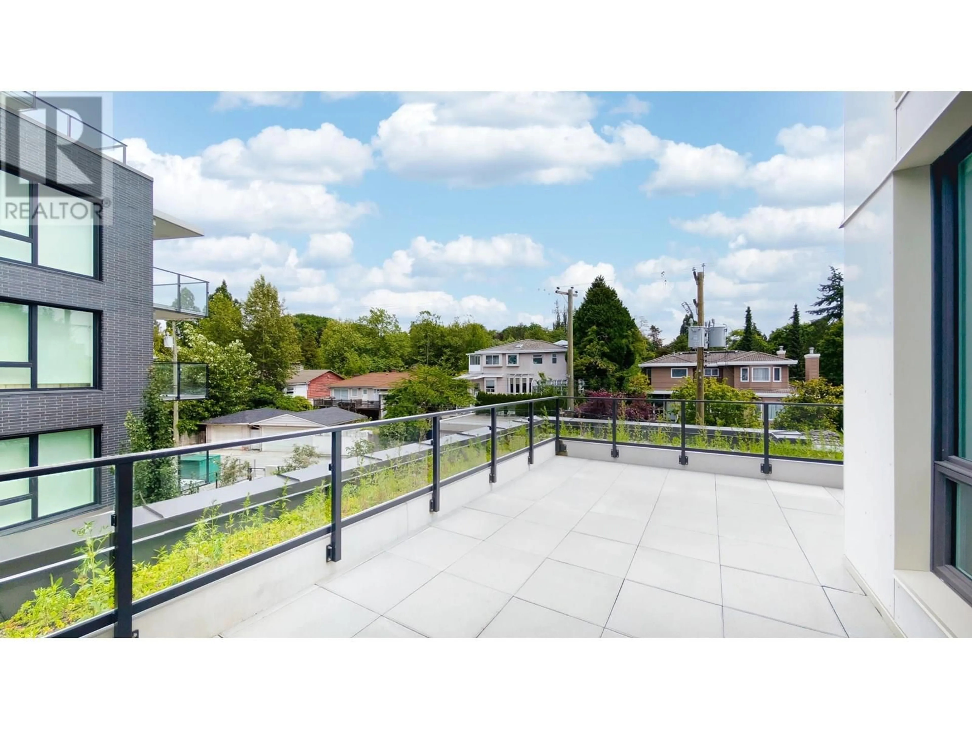 Patio, city buildings view from balcony for 315 - 5212 CAMBIE STREET, Vancouver British Columbia V5Z2Z7