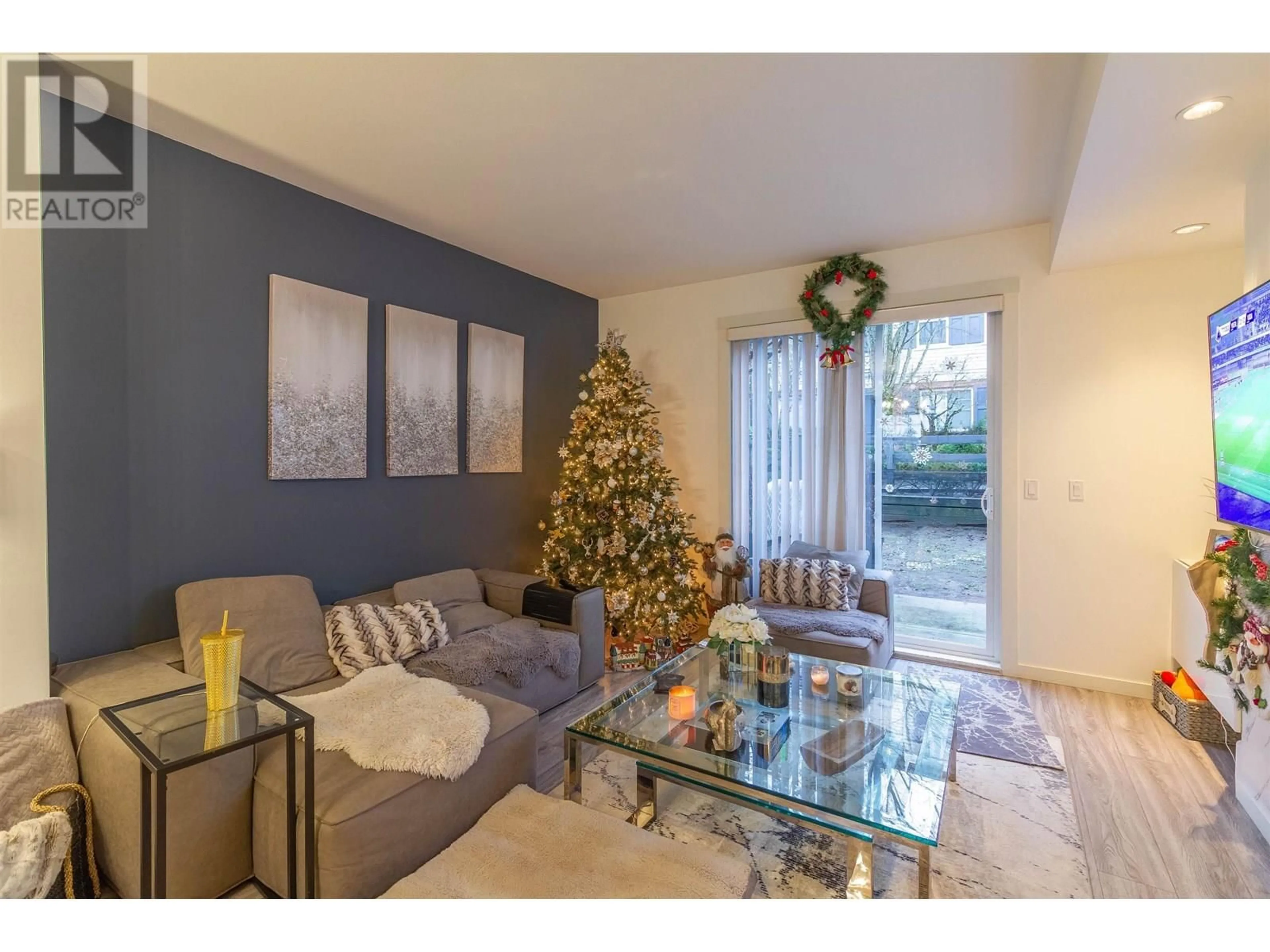 Living room with furniture, unknown for 103 - 688 EDGAR AVENUE, Coquitlam British Columbia V3K0A5