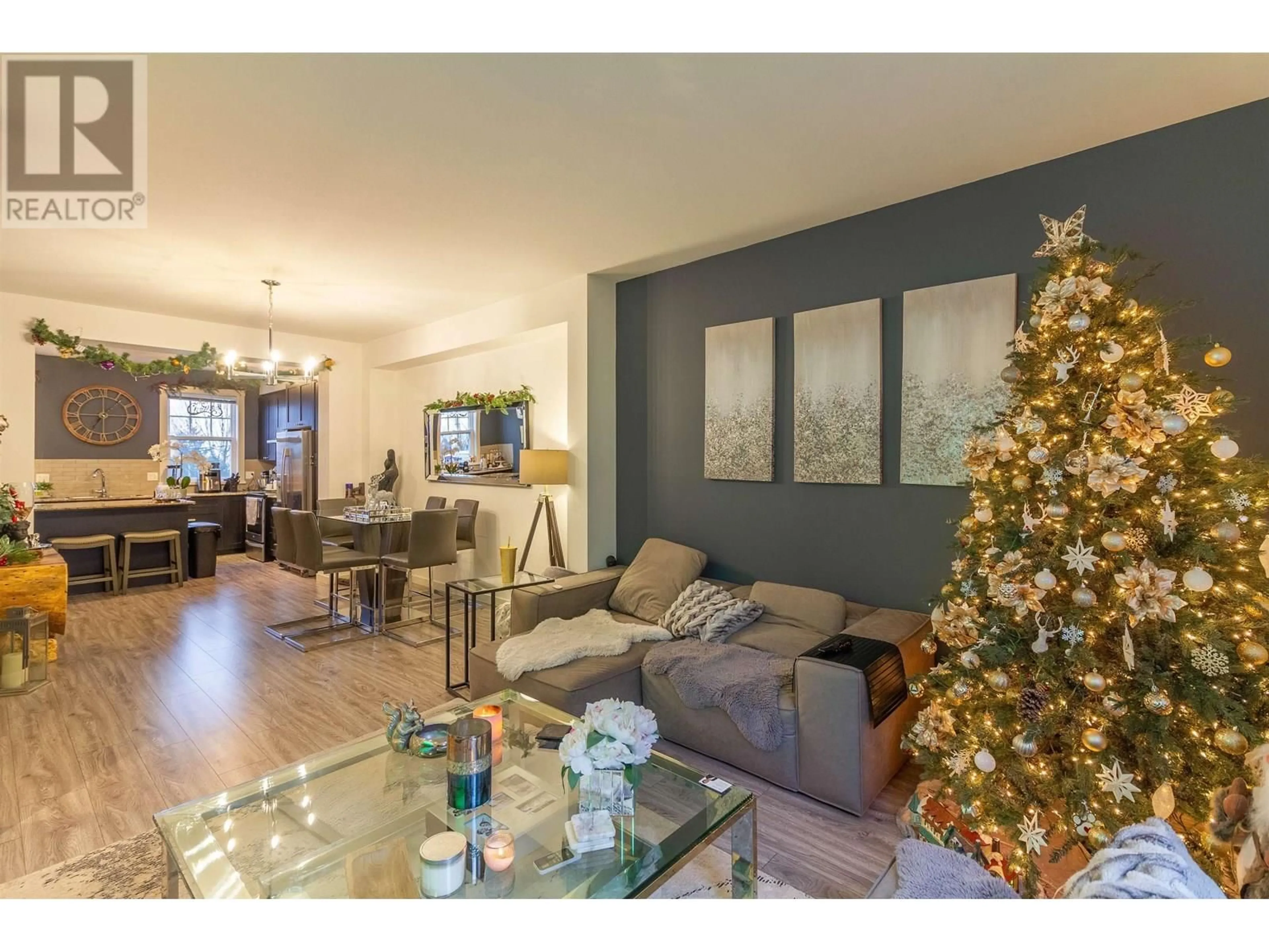Living room with furniture, wood/laminate floor for 103 - 688 EDGAR AVENUE, Coquitlam British Columbia V3K0A5