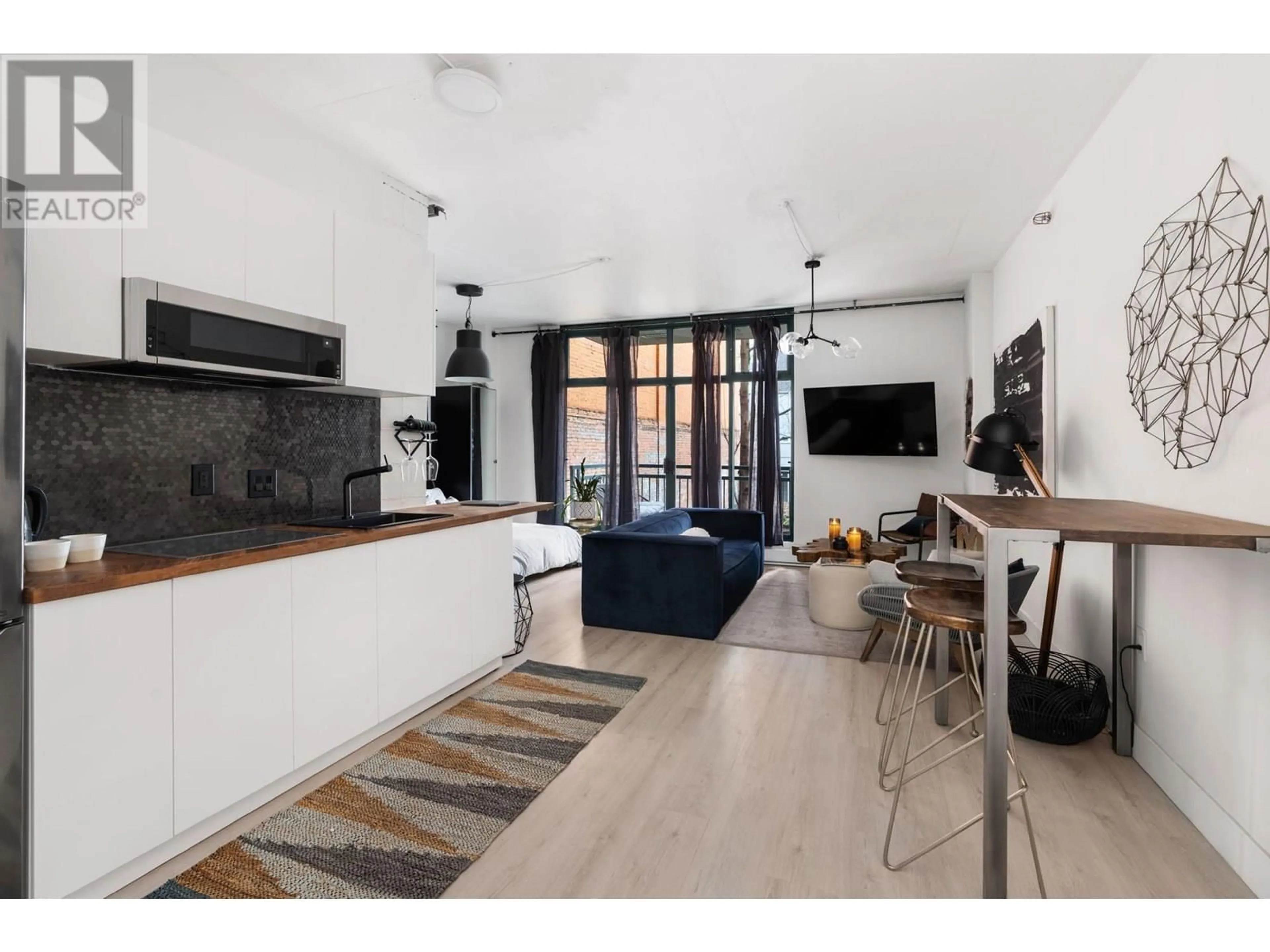 Open concept kitchen, unknown for 212 - 22 CORDOVA STREET, Vancouver British Columbia V6A4G8