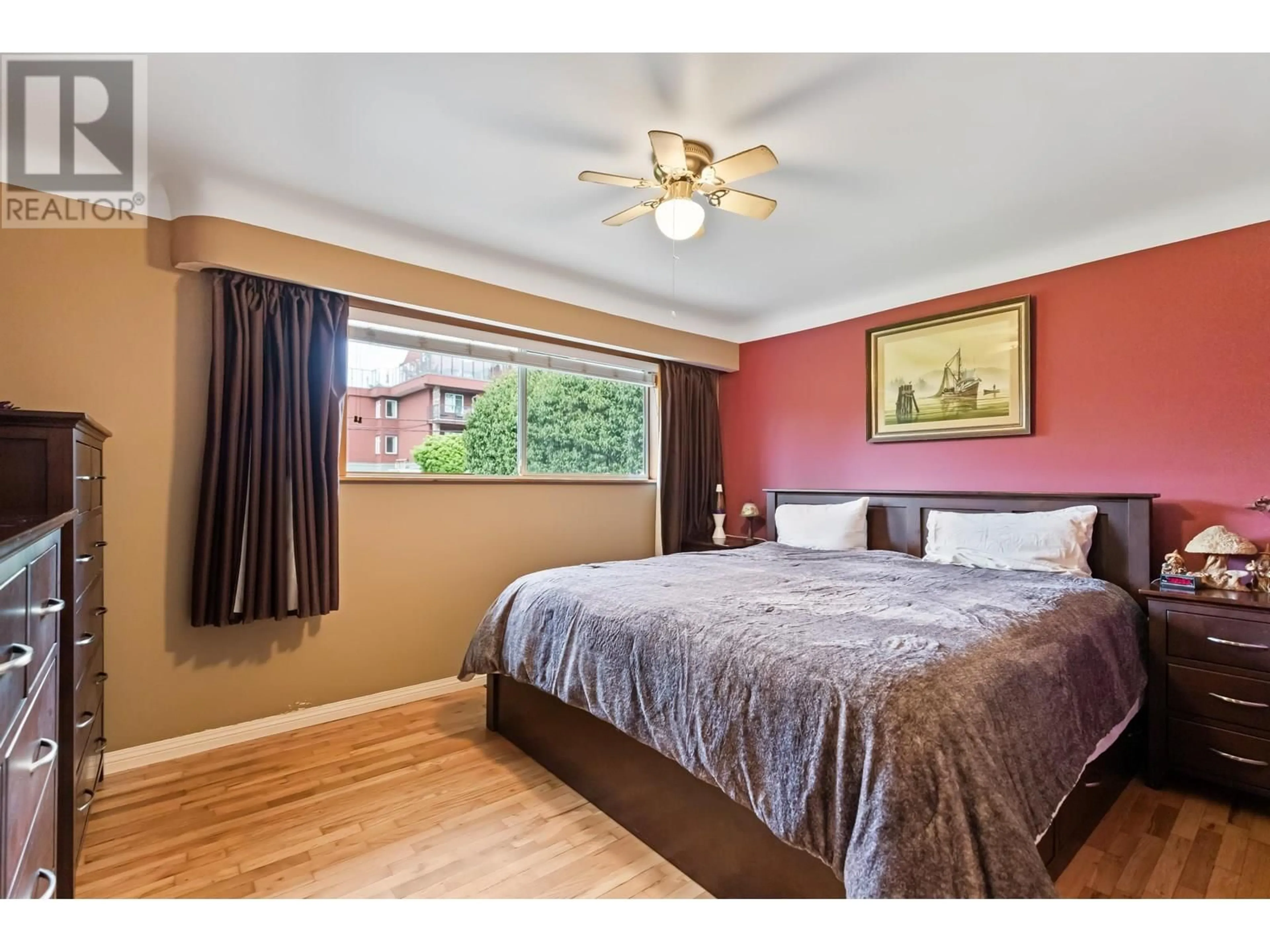 Bedroom with bed, wood/laminate floor for 22128 119 AVENUE, Maple Ridge British Columbia V2X2Y8
