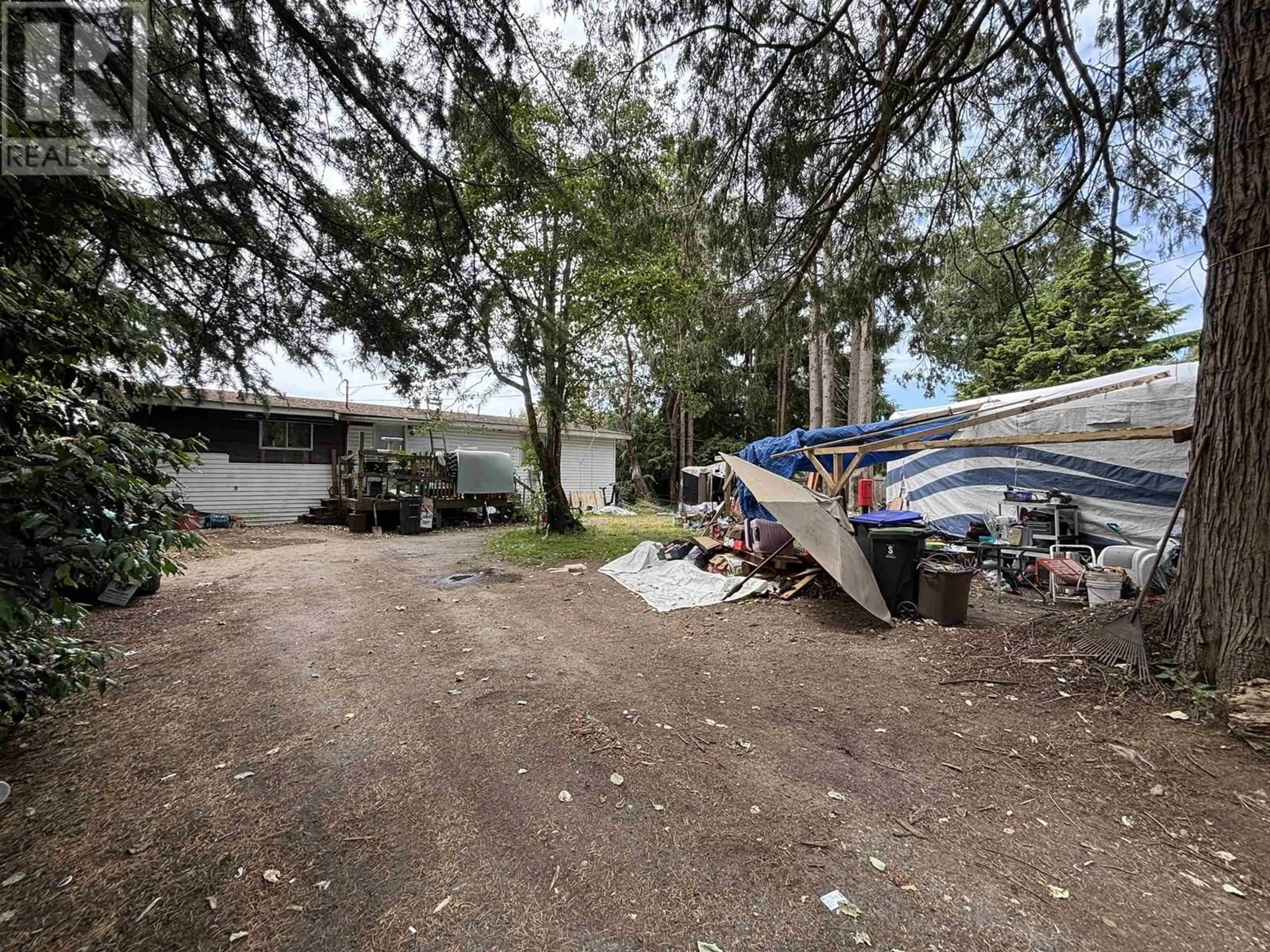 A pic from outside/outdoor area/front of a property/back of a property/a pic from drone, street for 6369 NORWEST BAY ROAD, Sechelt British Columbia V7Z0M5