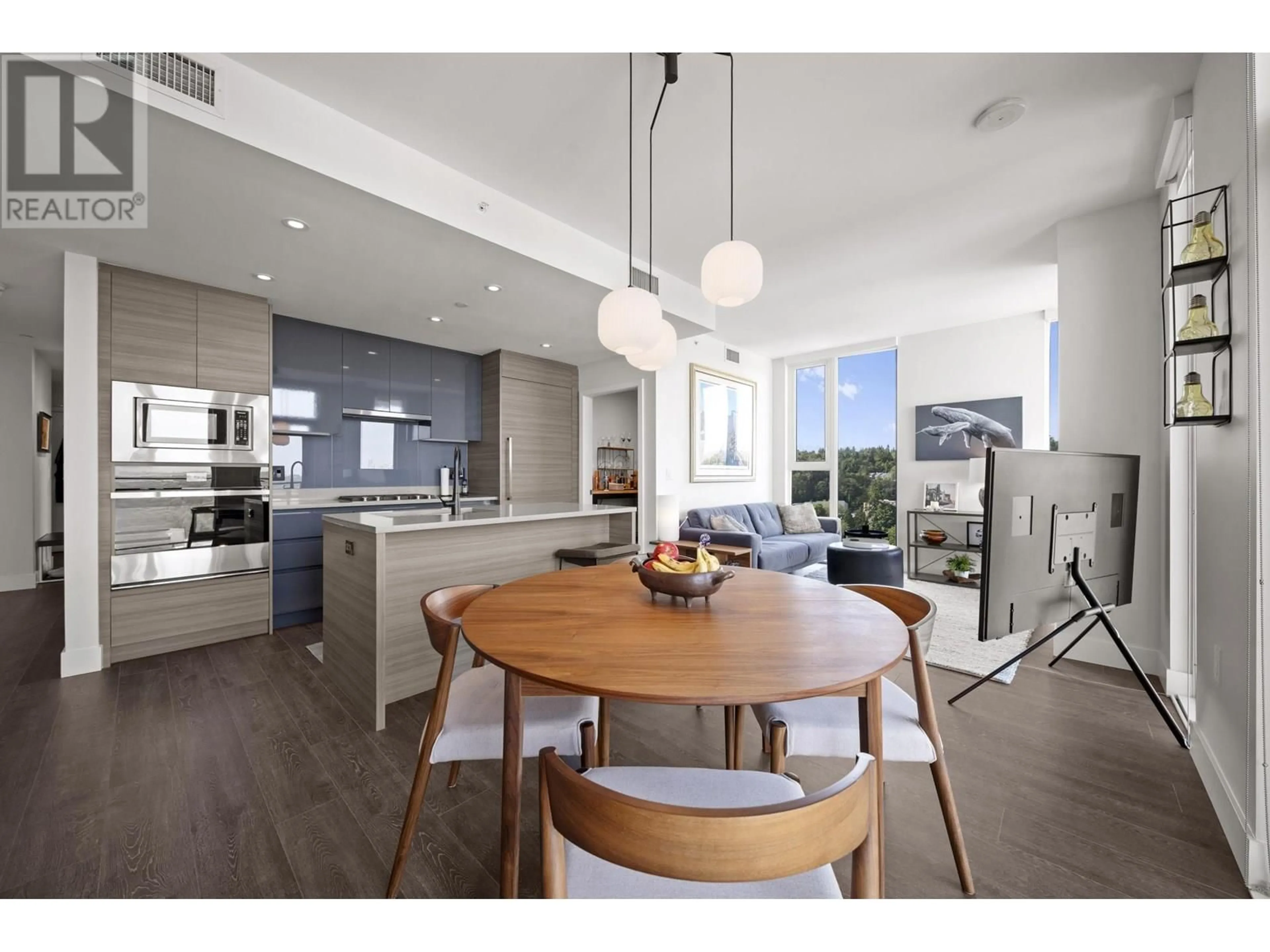 Open concept kitchen, wood/laminate floor for 2303 - 3538 SAWMILL CRESCENT, Vancouver British Columbia V5S0J8