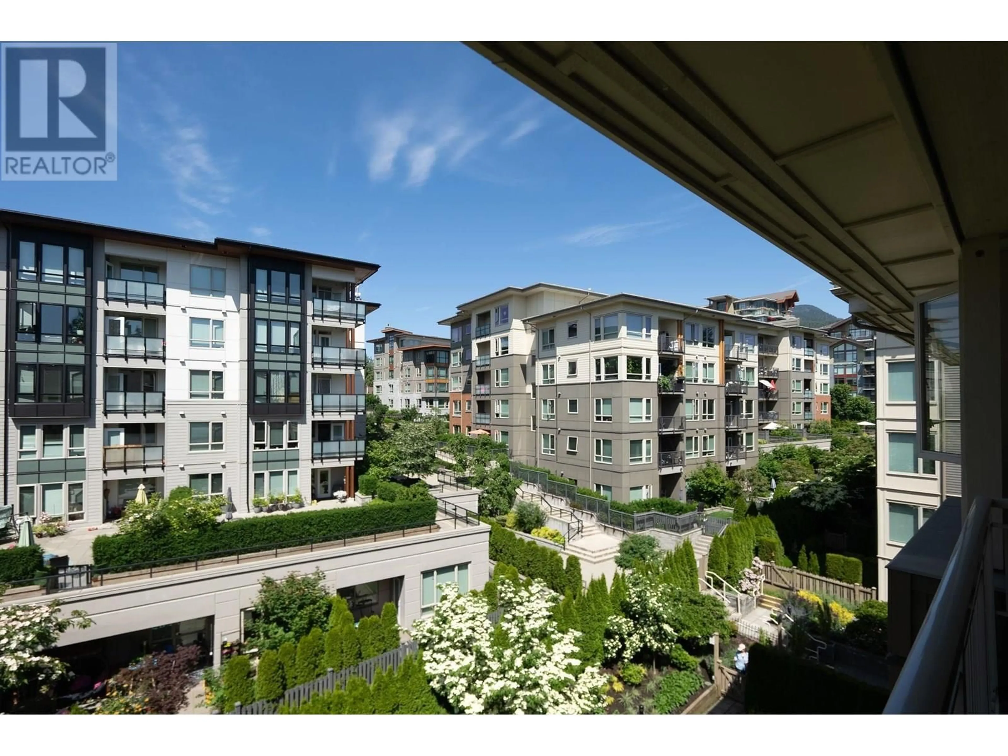 Patio, city buildings view from balcony for 410 - 2665 MOUNTAIN HIGHWAY, Vancouver British Columbia V7J0A8