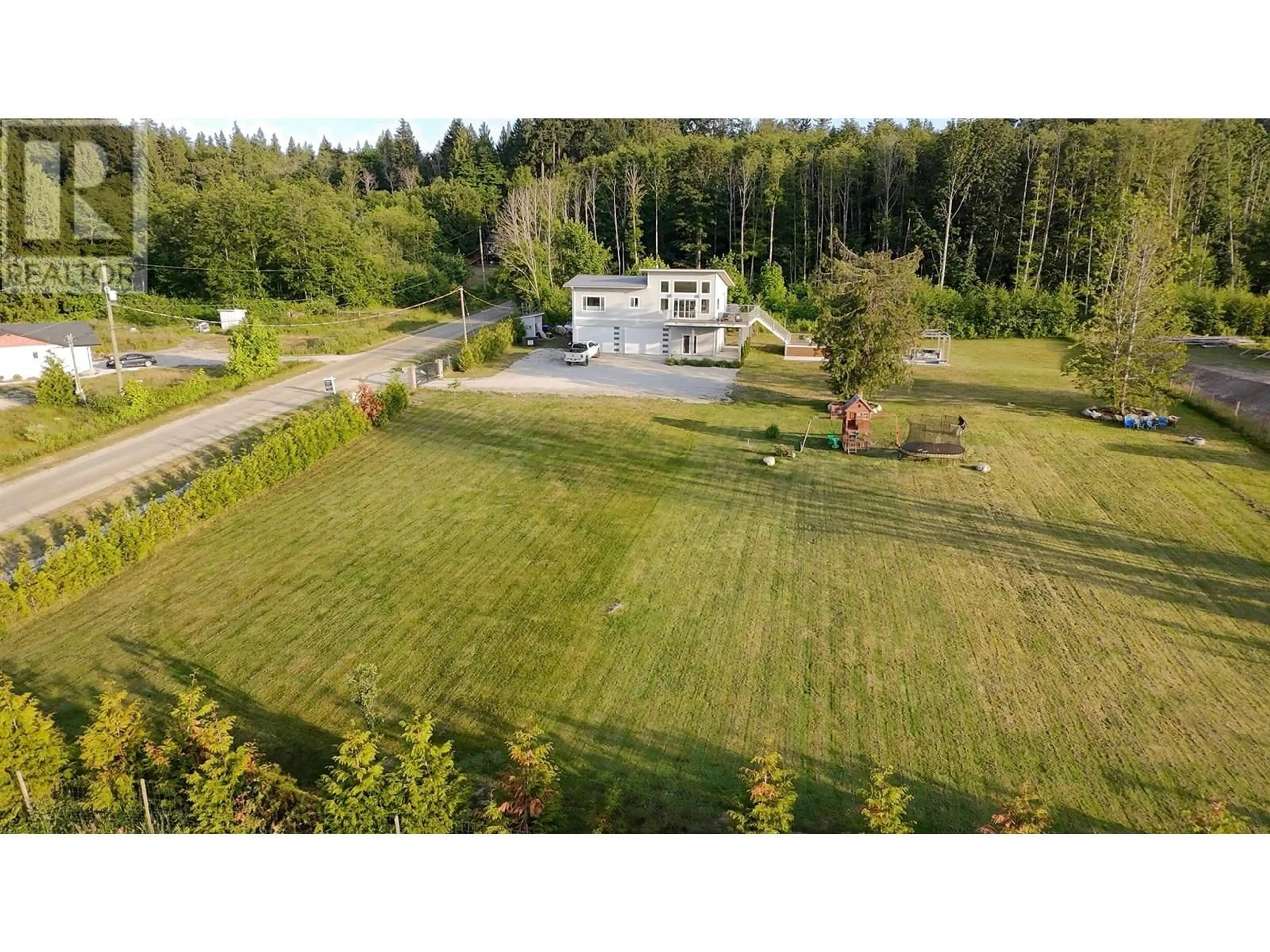 A pic from outside/outdoor area/front of a property/back of a property/a pic from drone, unknown for 6315 RIMROCK ROAD, Sechelt British Columbia V7Z0L1