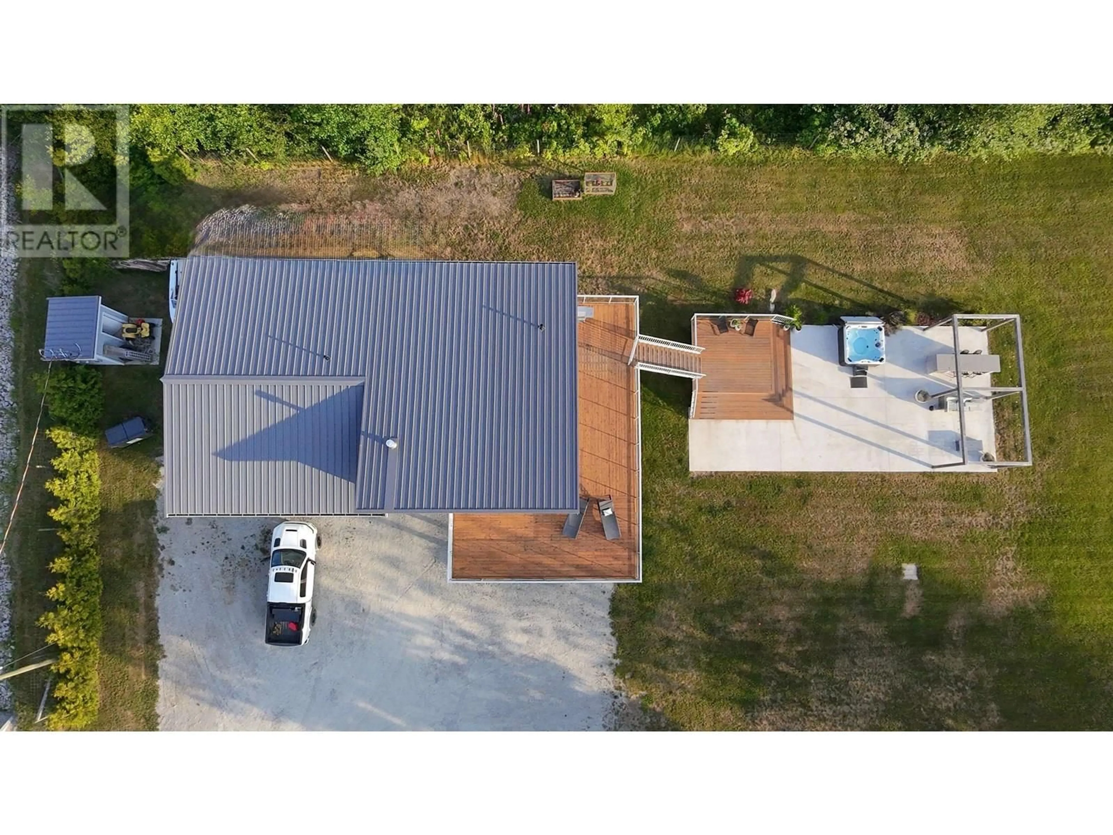 A pic from outside/outdoor area/front of a property/back of a property/a pic from drone, street for 6315 RIMROCK ROAD, Sechelt British Columbia V7Z0L1