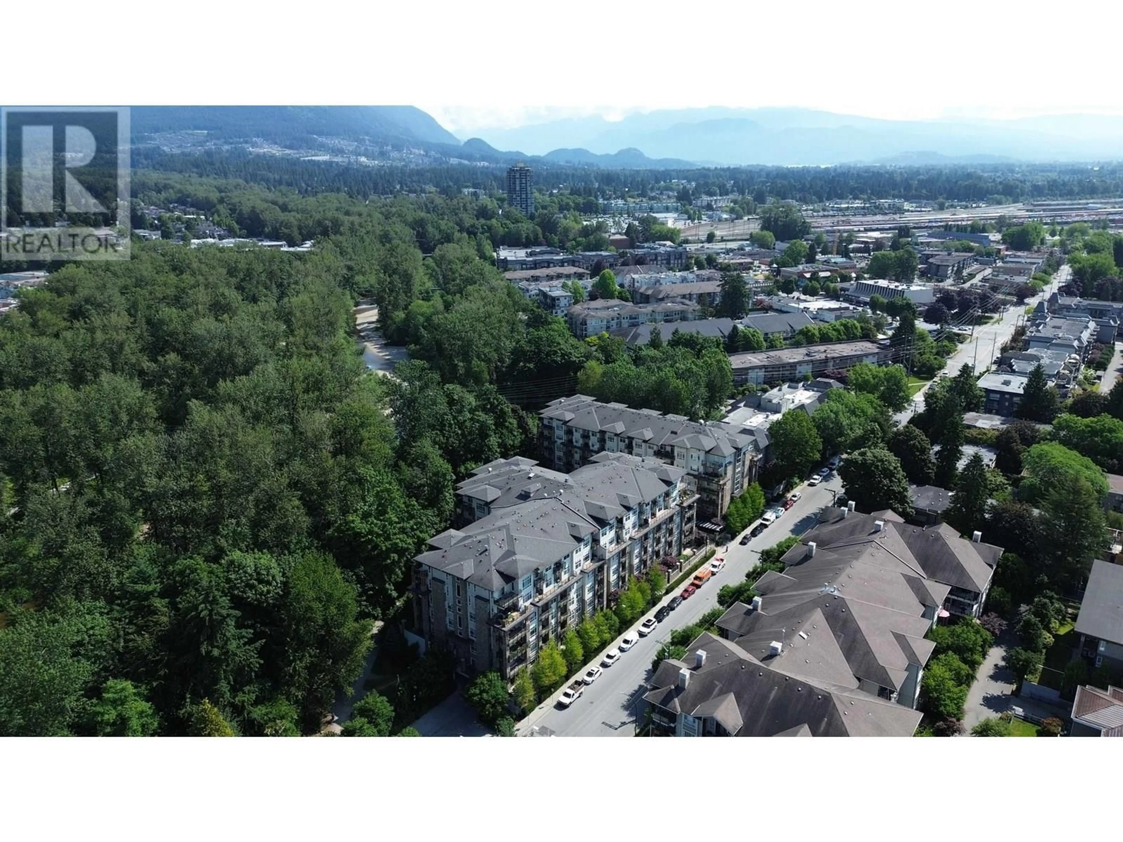 A pic from outside/outdoor area/front of a property/back of a property/a pic from drone, mountain view for 613 - 2495 WILSON AVENUE, Port Coquitlam British Columbia V3C0E4