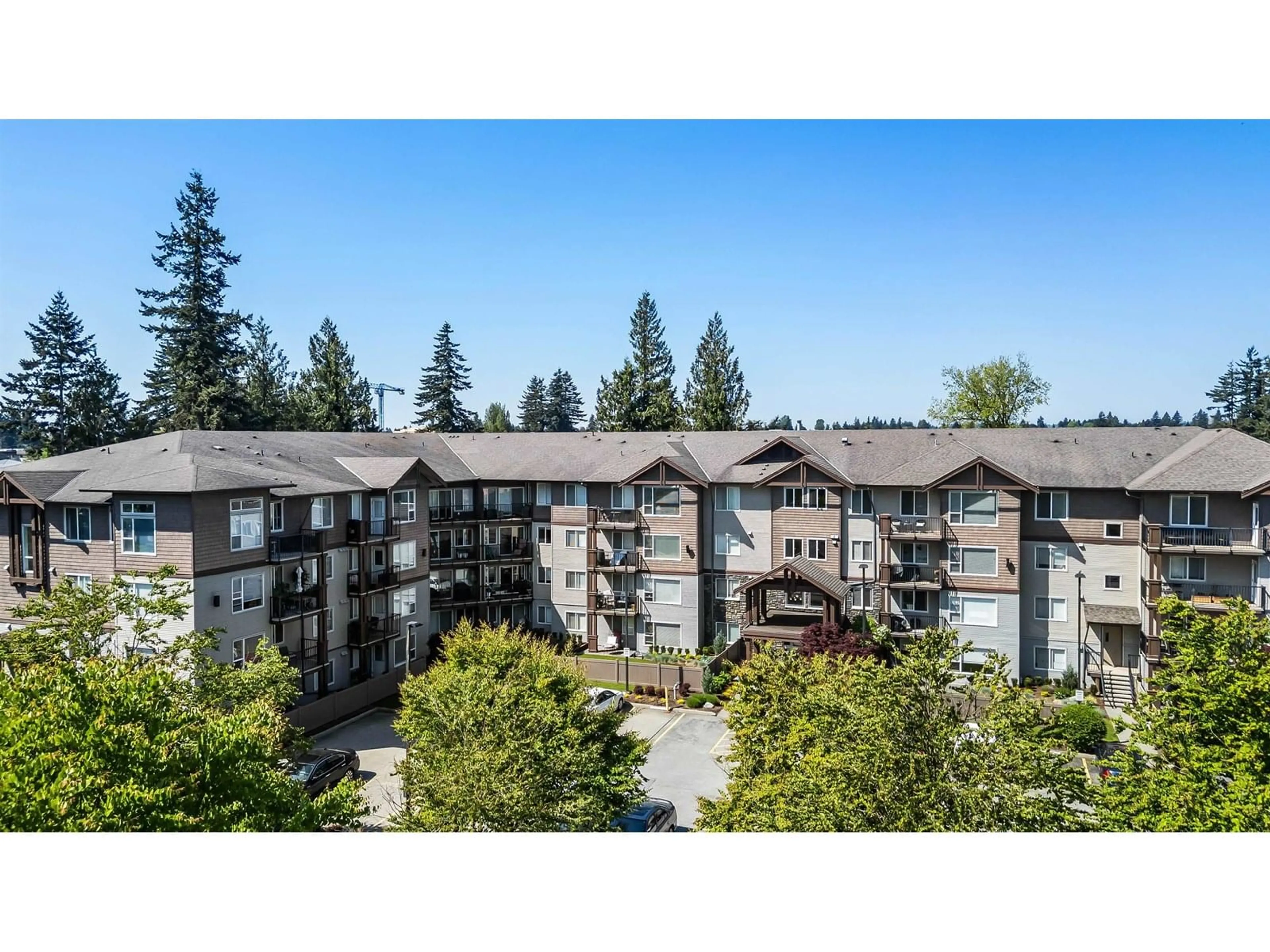 A pic from outside/outdoor area/front of a property/back of a property/a pic from drone, mountain view for 411 - 2581 LANGDON, Abbotsford British Columbia V2T7A3
